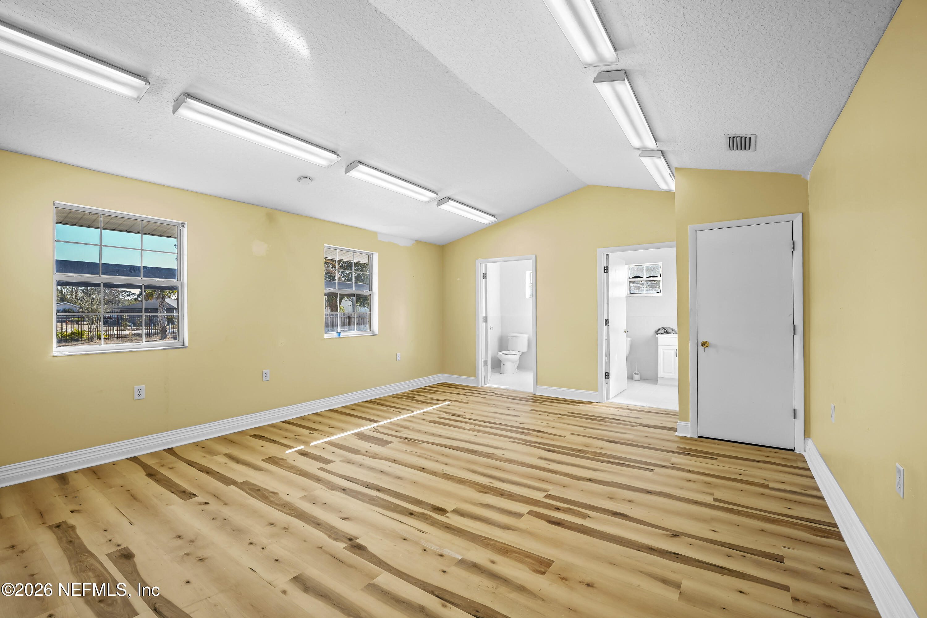 35 Cinnamon Street Middleburg, FL 32068 - Photo 19 of 56 a view of a room with wooden floor