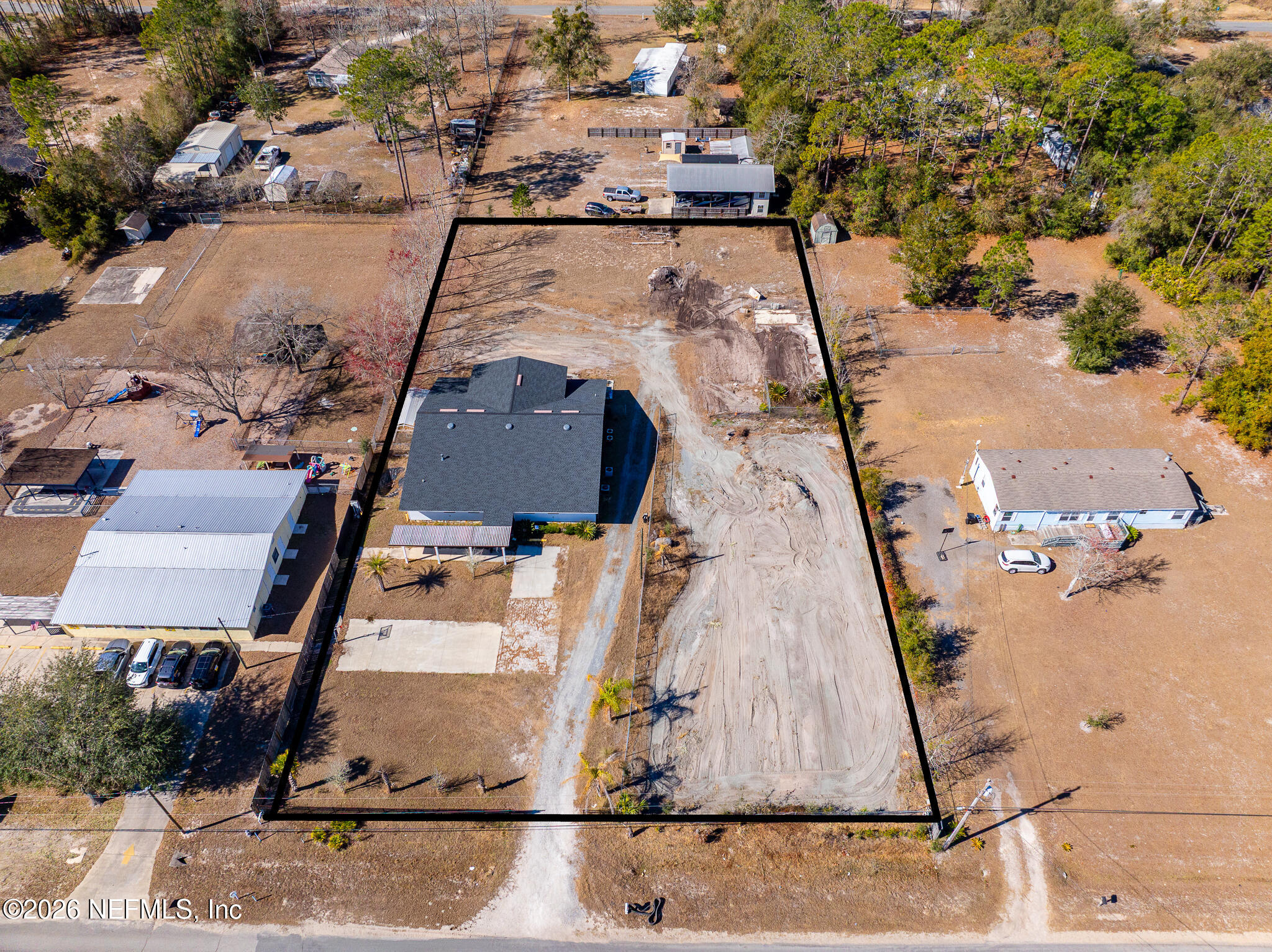 35 Cinnamon Street Middleburg, FL 32068 - Photo 2 of 56 an aerial view of a large buildings