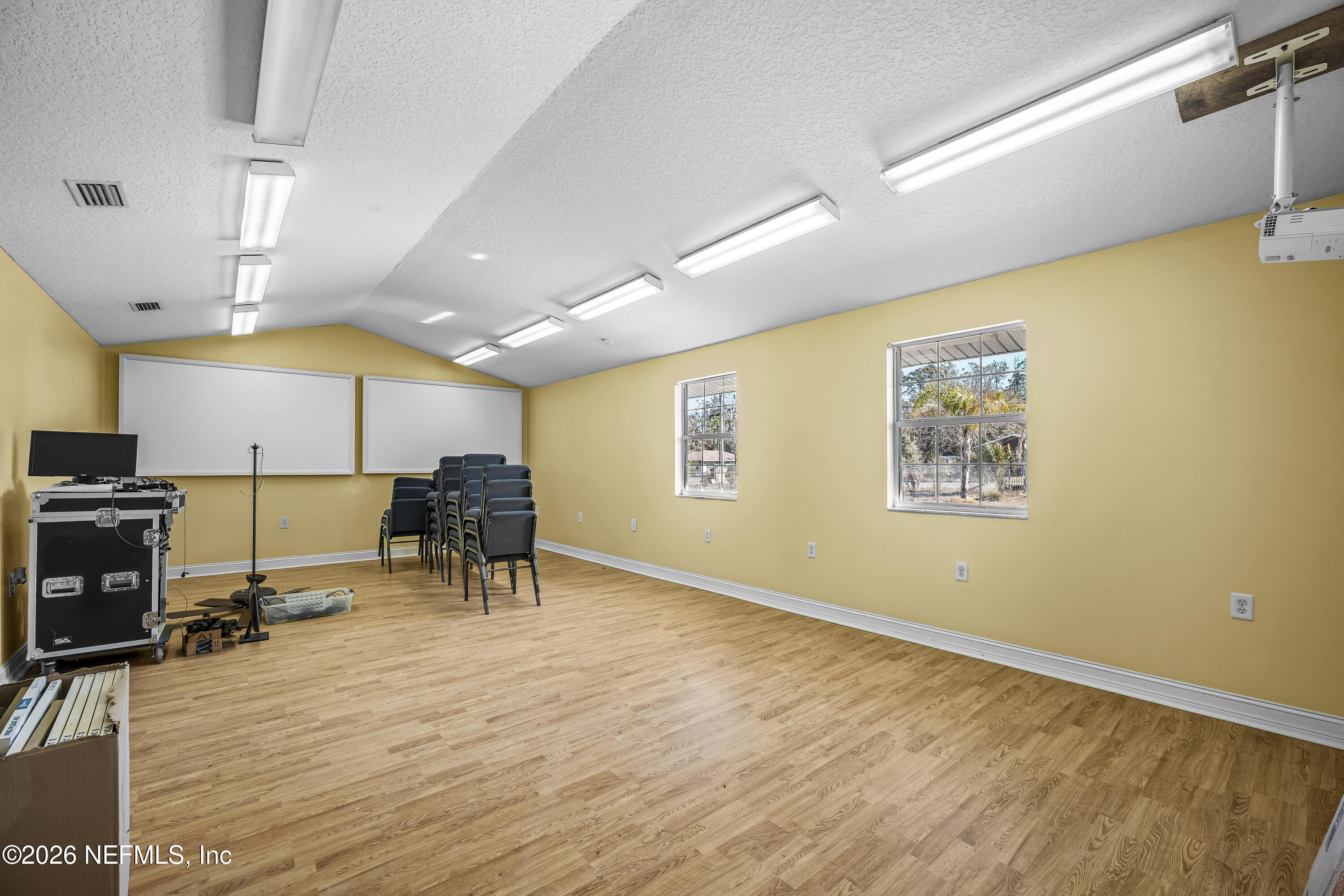 35 Cinnamon Street Middleburg, FL 32068 - Photo 23 of 56 a room with lots of furniture and a flat screen tv