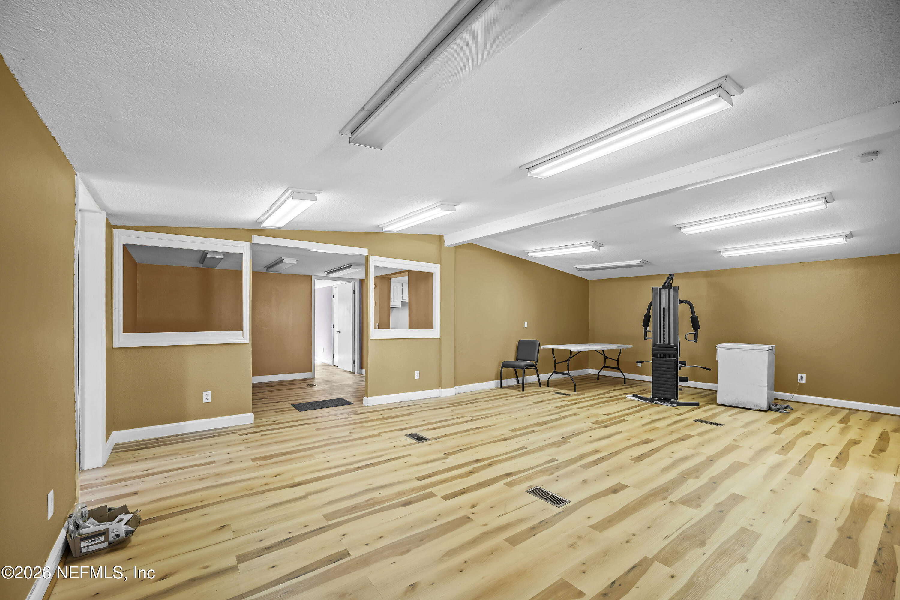 35 Cinnamon Street Middleburg, FL 32068 - Photo 26 of 56 a view of a room with wooden floor and chair
