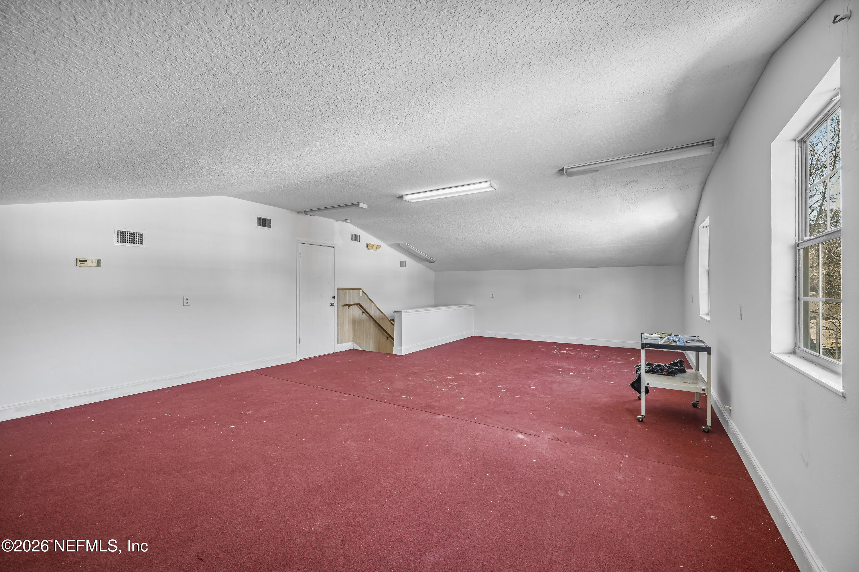 35 Cinnamon Street Middleburg, FL 32068 - Photo 44 of 56 a view of a livingroom with a staircase