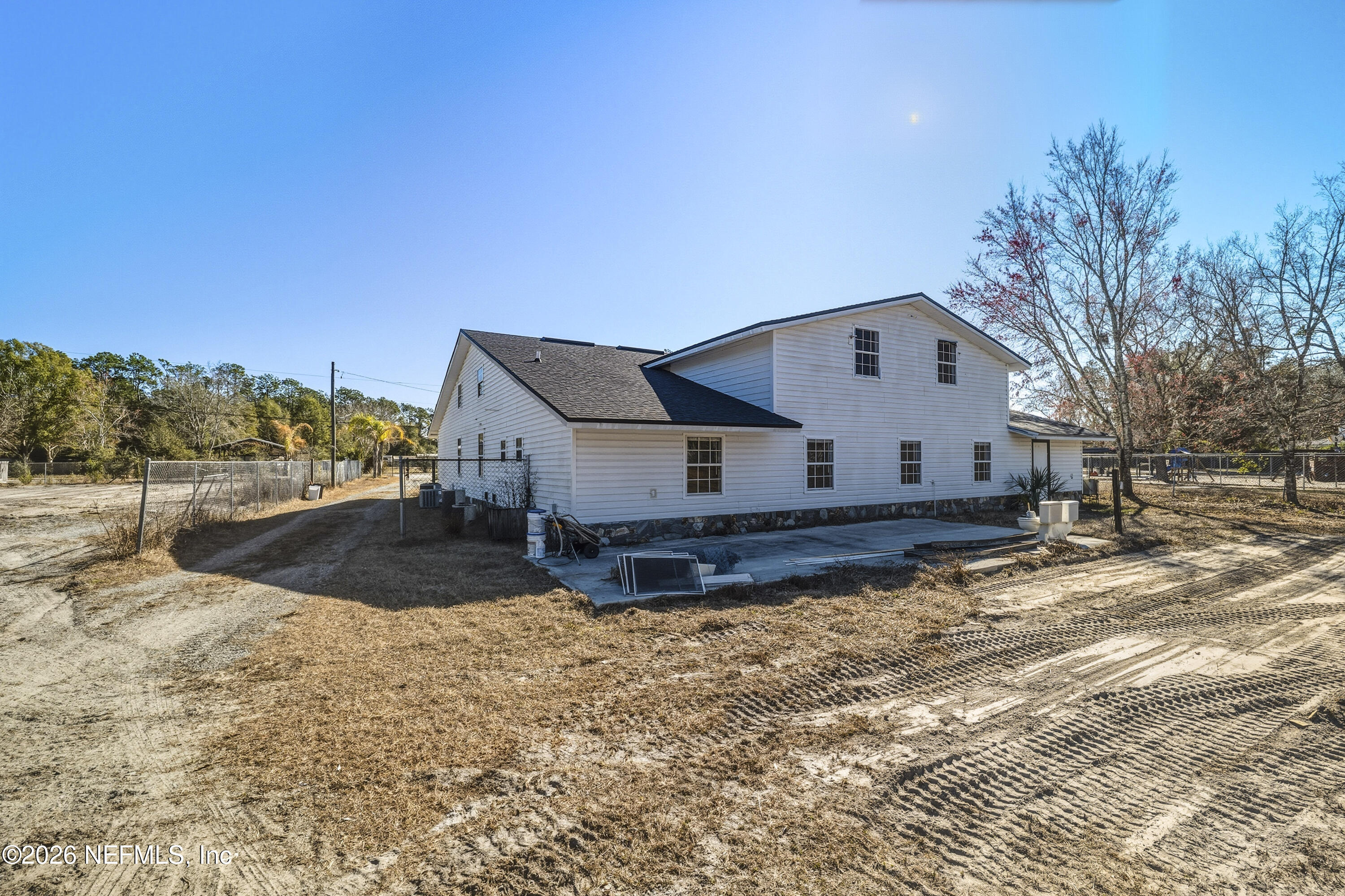 35 Cinnamon Street Middleburg, FL 32068 - Photo 46 of 56 a view of a house with a yard