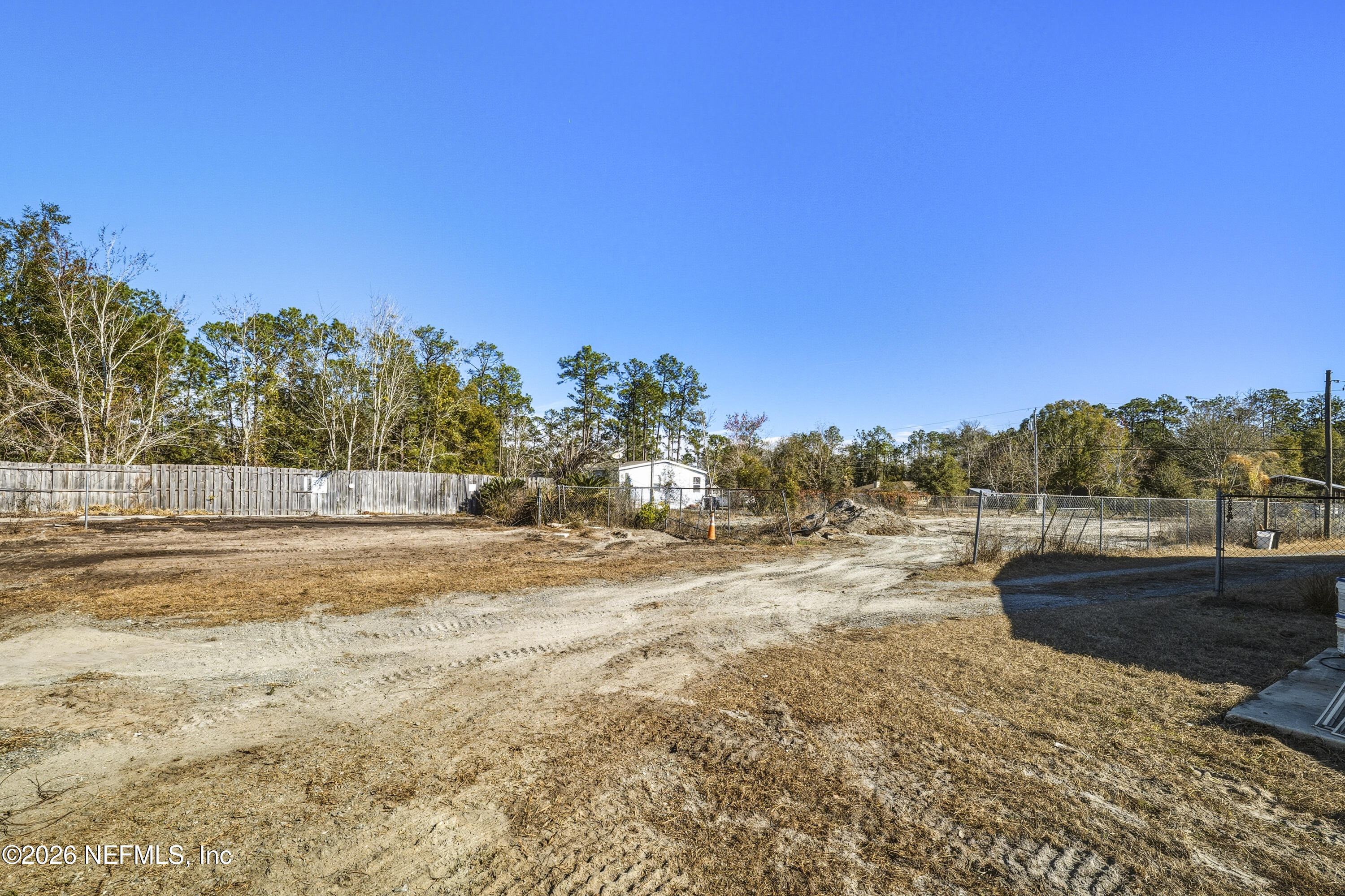 35 Cinnamon Street Middleburg, FL 32068 - Photo 50 of 56 a view of dirt yard and mountain view