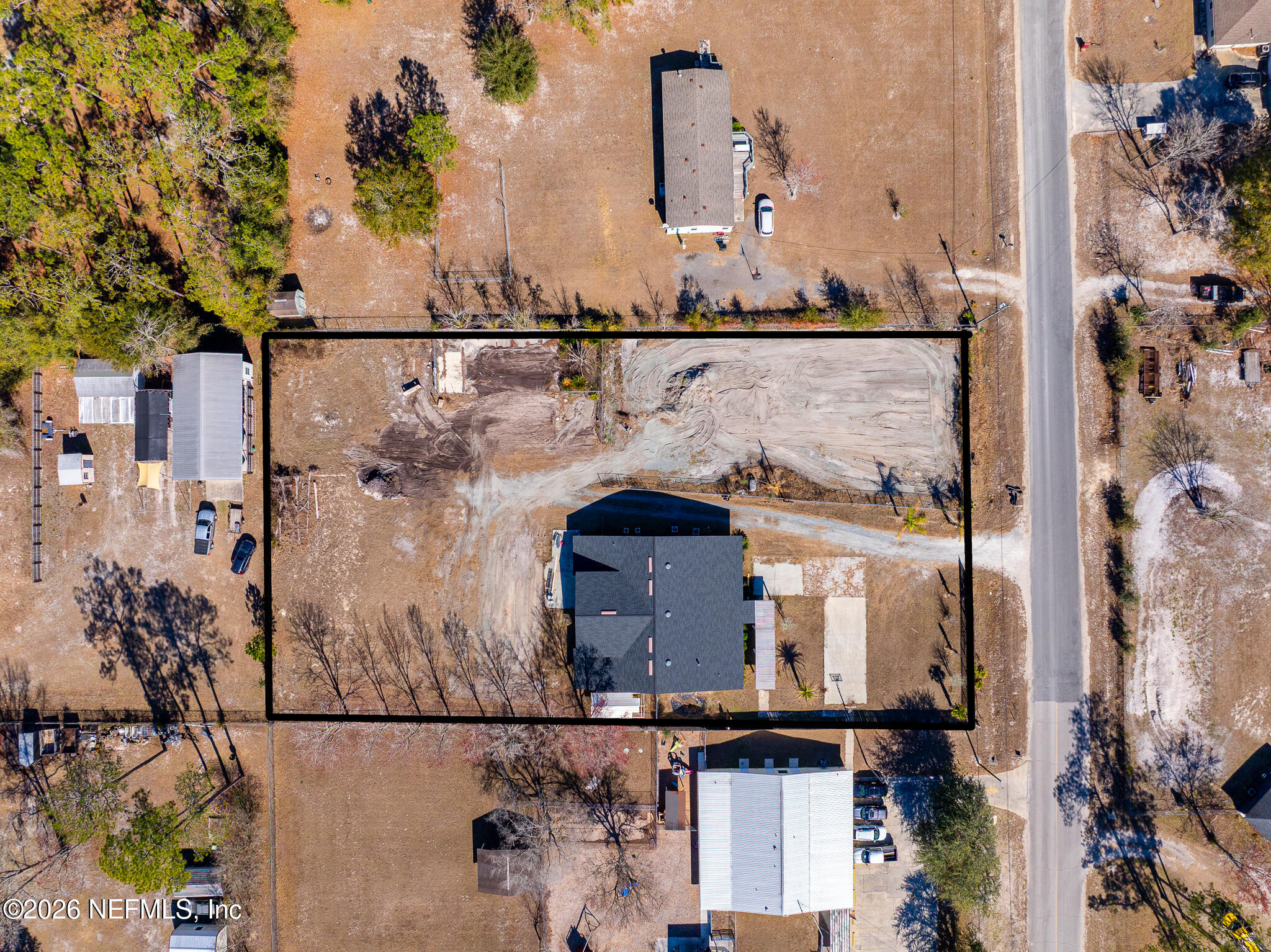 35 Cinnamon Street Middleburg, FL 32068 - Photo 51 of 56 an aerial view of a house with a yard
