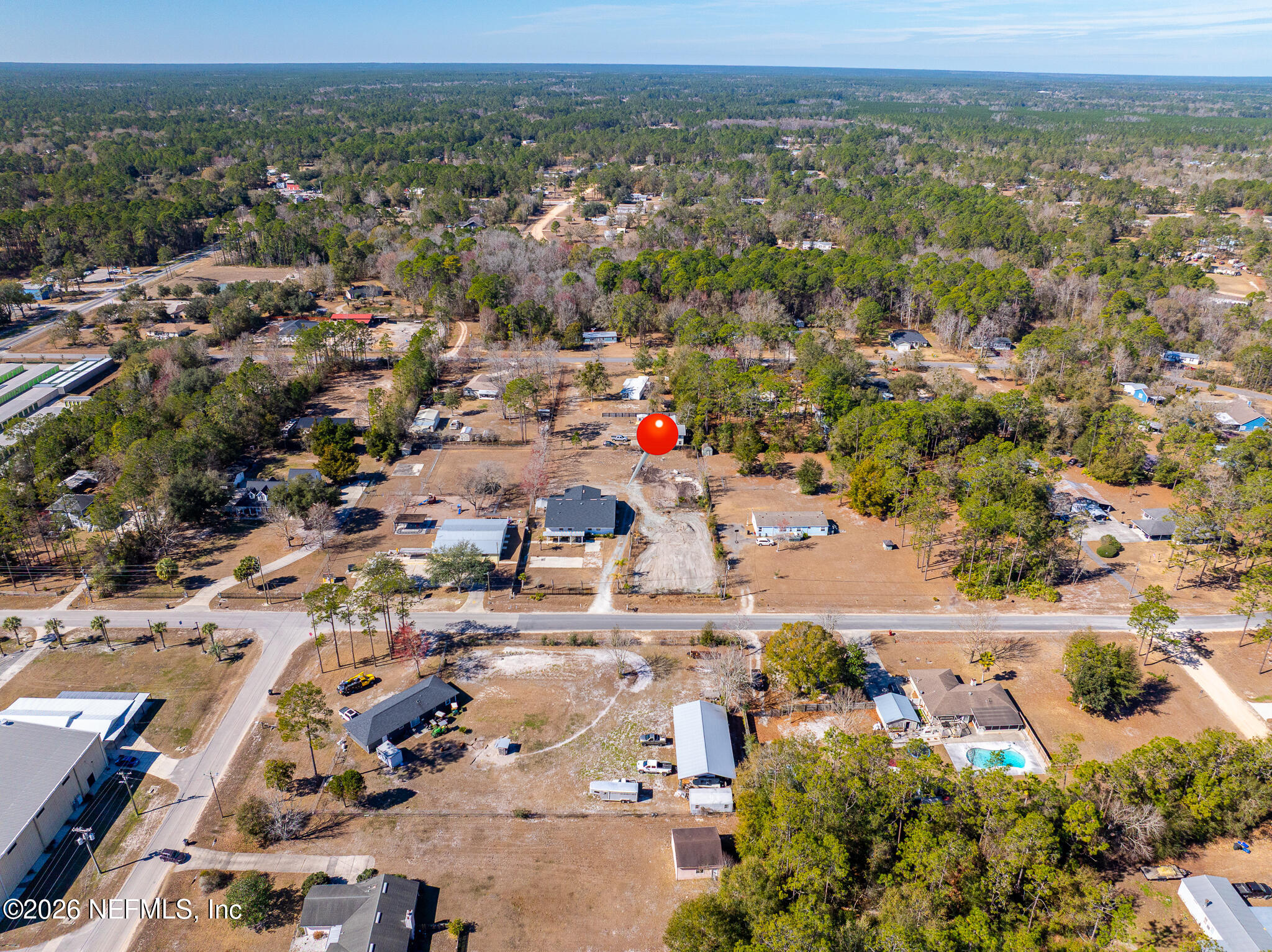 35 Cinnamon Street Middleburg, FL 32068 - Photo 52 of 56 an aerial view of residential houses with outdoor space