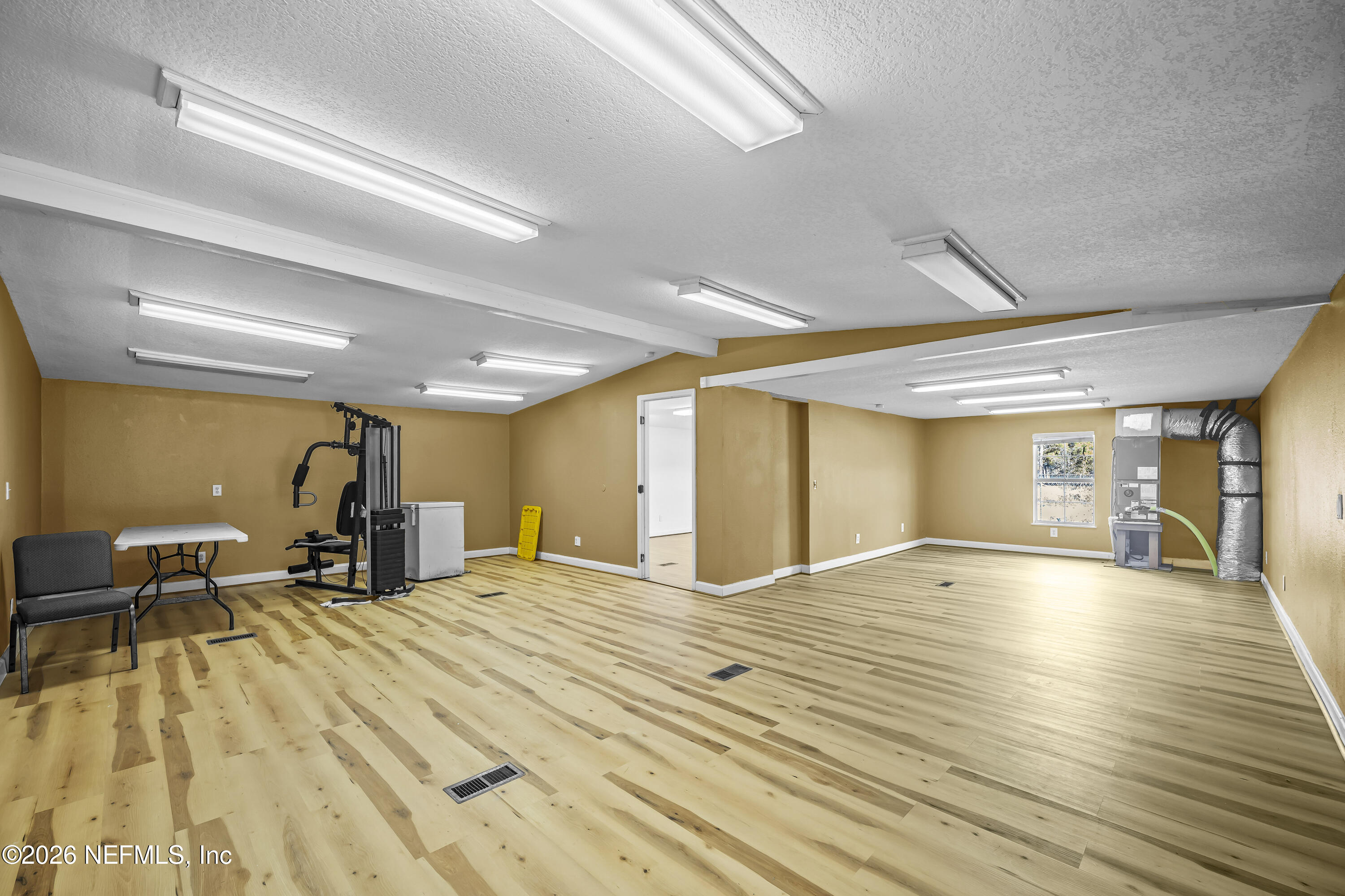 35 Cinnamon Street Middleburg, FL 32068 - Photo 7 of 56 a view of a room with gym equipment