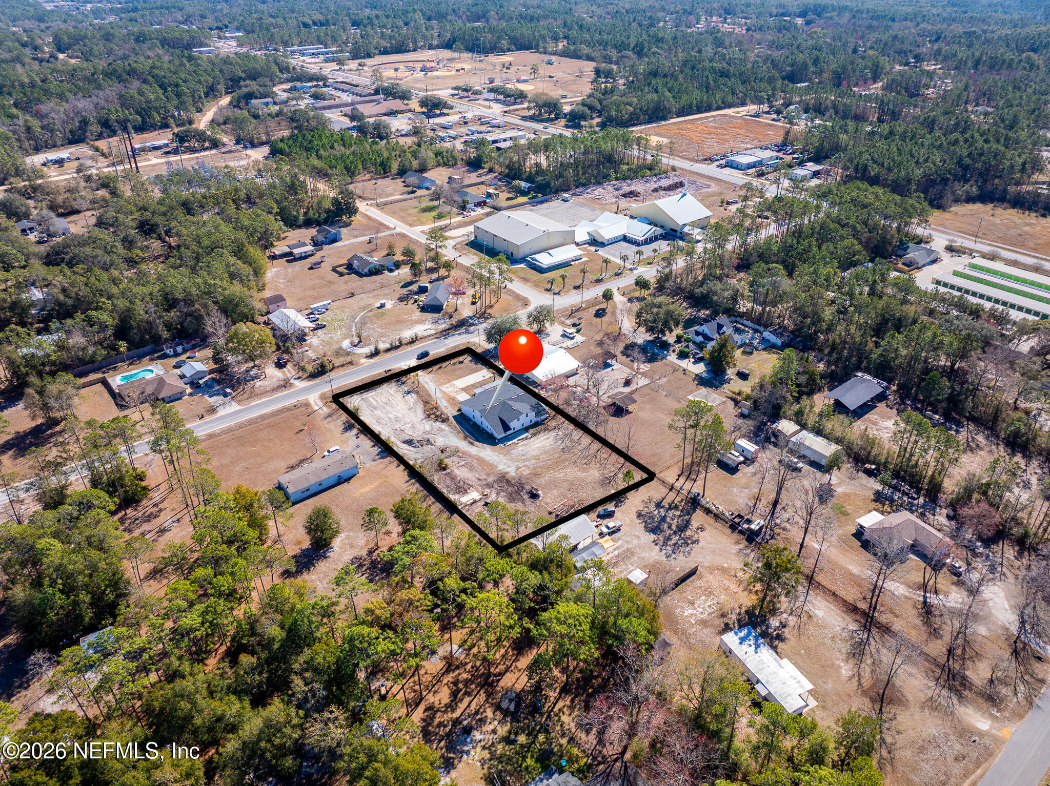 35 Cinnamon Street Middleburg, FL 32068 - Photo 8 of 56 an aerial view of a house with a yard and lake view