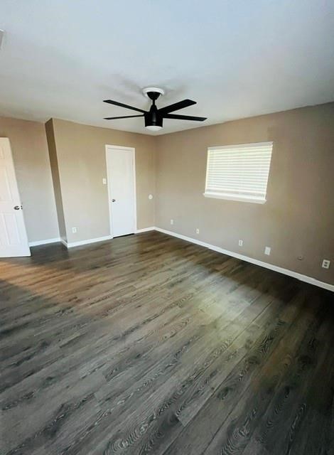 5017 Meandering Lane, Unit A Corpus Christi, TX 78413 - Photo 7 of 13 an empty room with wooden floor door and windows