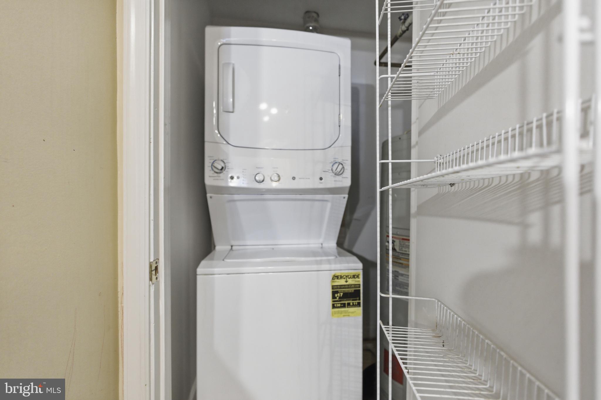 13609 Sir Thomas Way, Unit 1C24 Silver Spring, MD 20904 - Photo 16 of 16 a utility room with dryer and washer