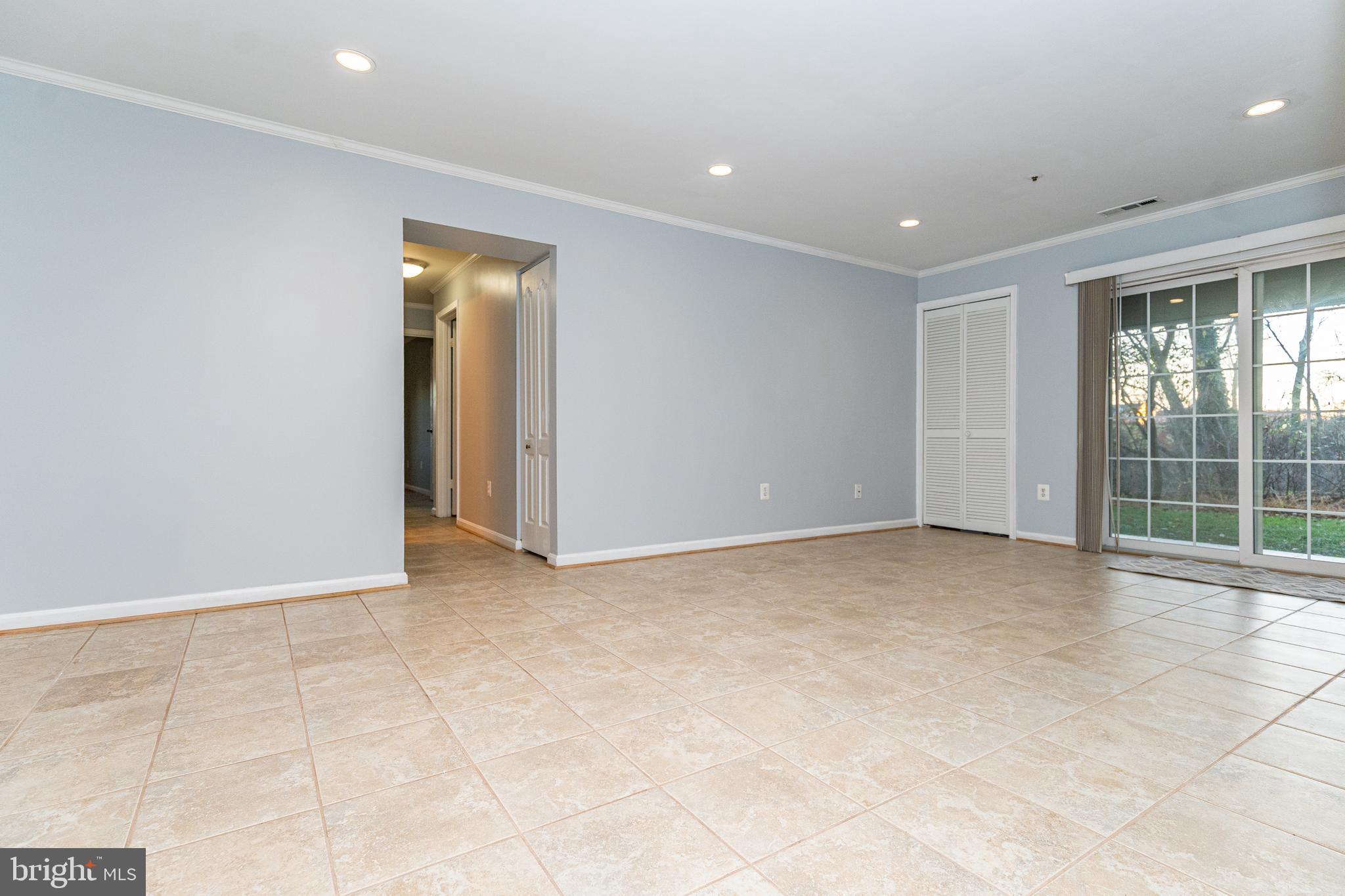 8347 Montgomery Run Road, Unit B Ellicott City, MD 21043 - Photo 14 of 39 a view of an empty room with a window