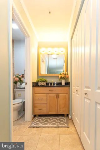 a kitchen with a refrigerator sink and a stove