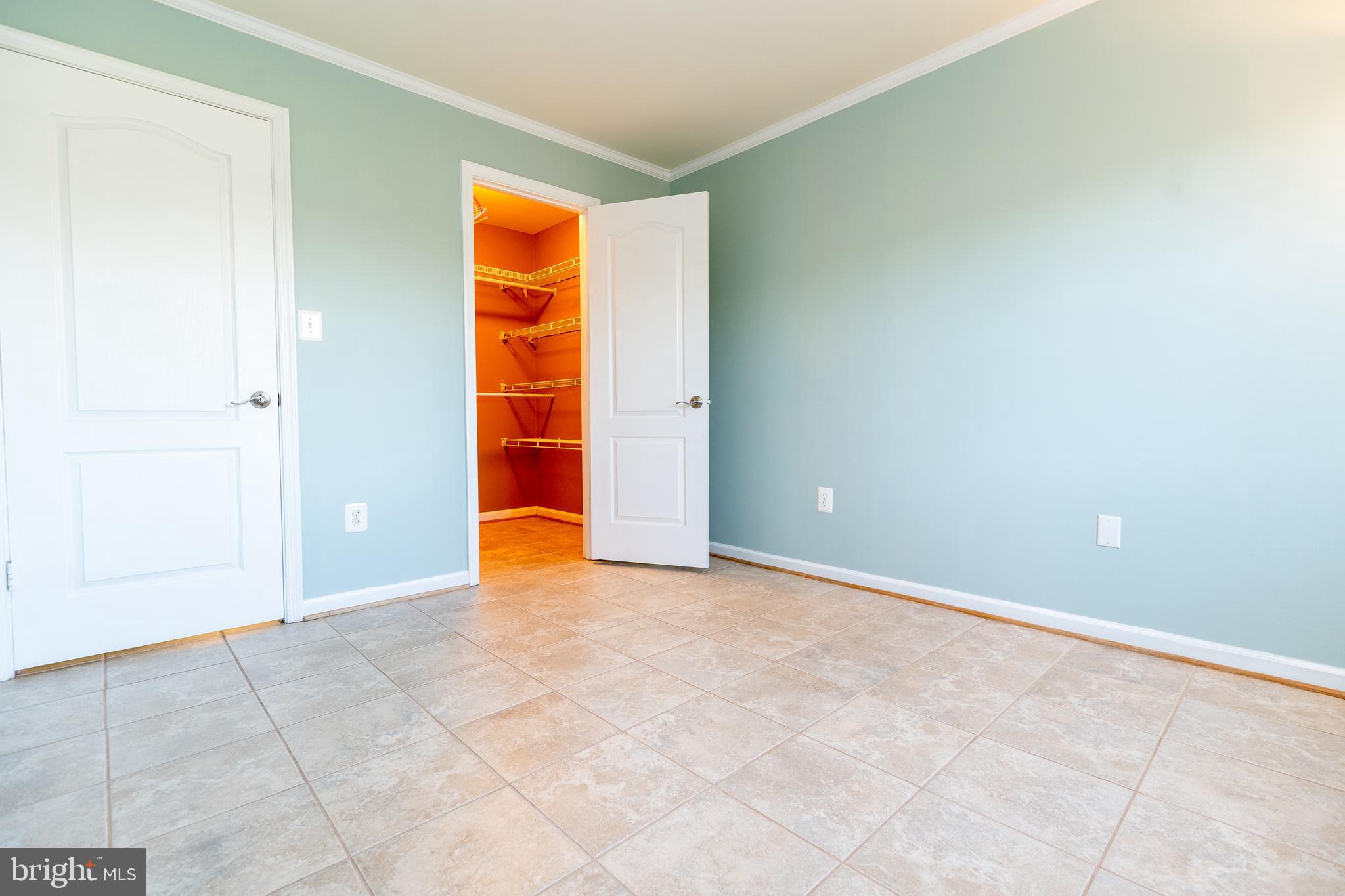 8347 Montgomery Run Road, Unit B Ellicott City, MD 21043 - Photo 27 of 39 an empty room with closet