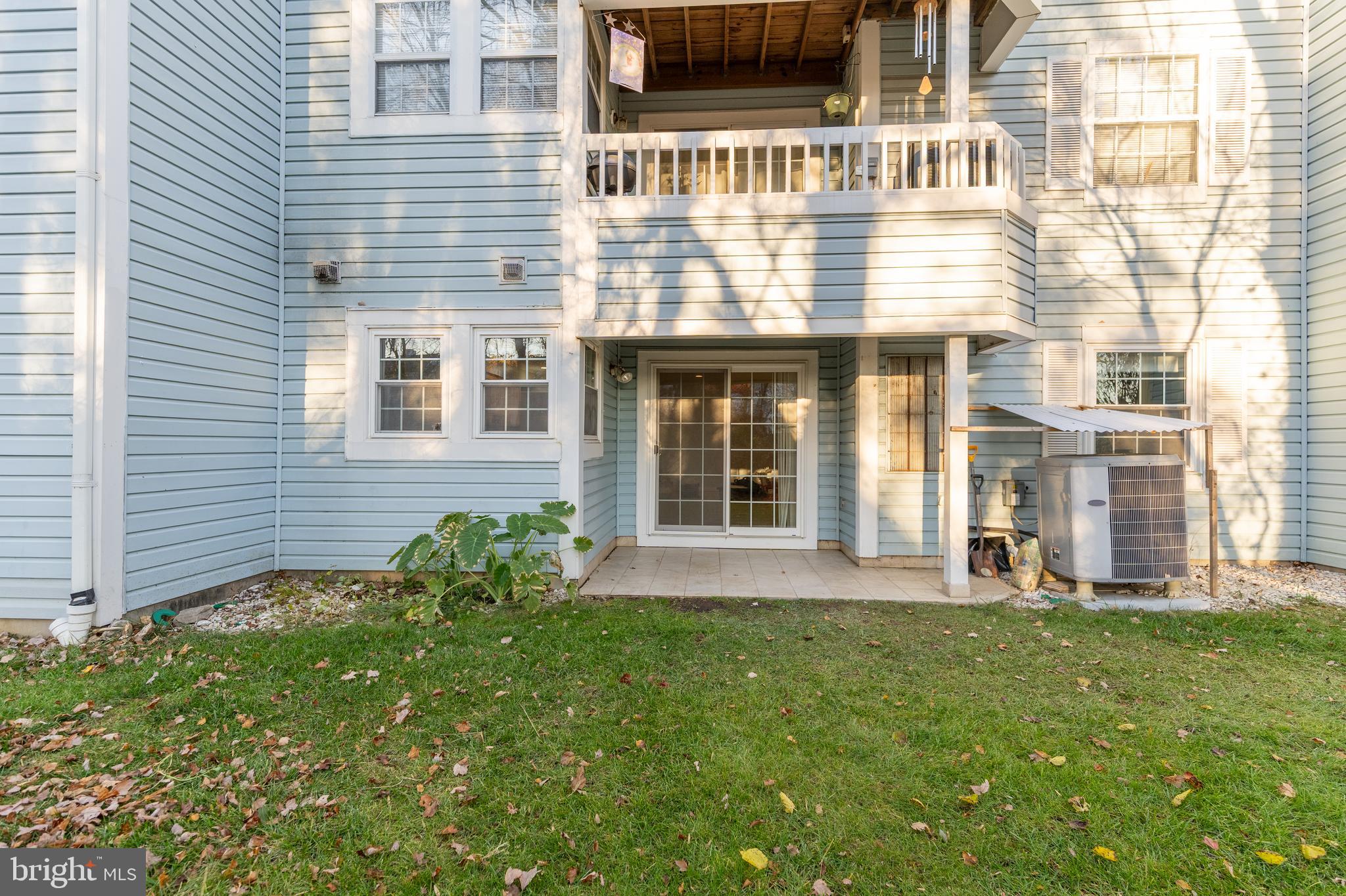 8347 Montgomery Run Road, Unit B Ellicott City, MD 21043 - Photo 30 of 39 a front view of a house with a yard