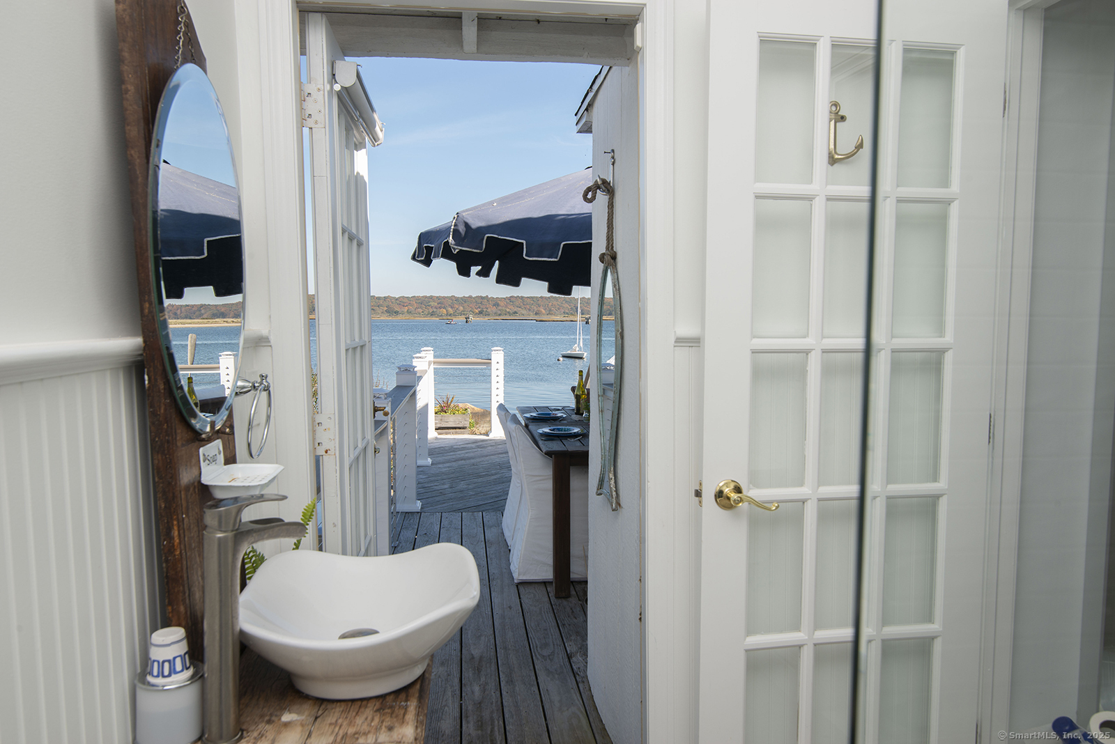 114 Jupiter Point Road Groton, CT 06340 - Photo 19 of 34 a bathroom with a toilet and a shower