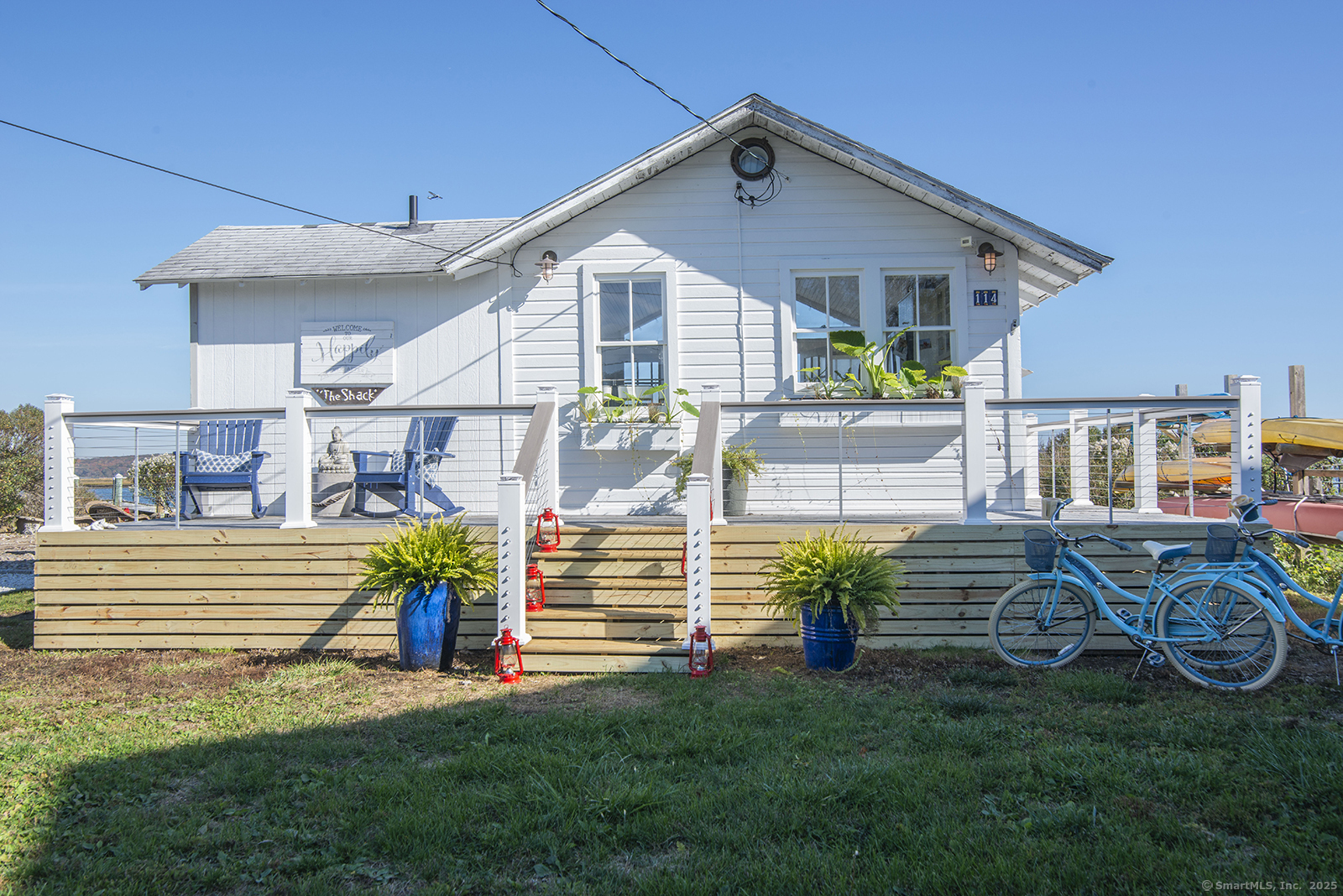 114 Jupiter Point Road Groton, CT 06340 - Photo 2 of 34 a front view of a house with a yard