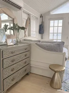 a bathroom with a sink a mirror and a shower