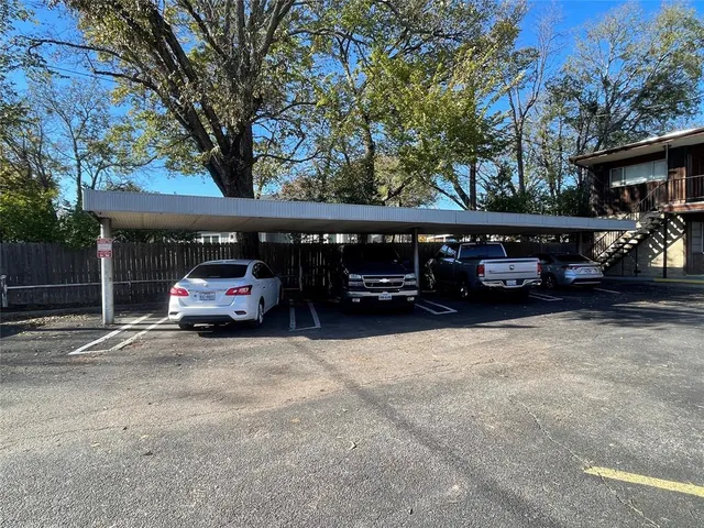 a view of a brick house with an empty space