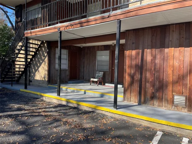 a car parked in front of a building