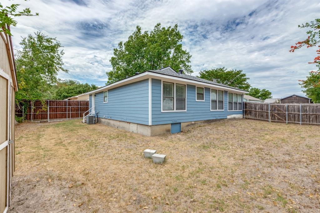 312 Mockingbird Lane Denton, TX 76209 - Photo 25 of 25 Back of home with a huge fenced in yard