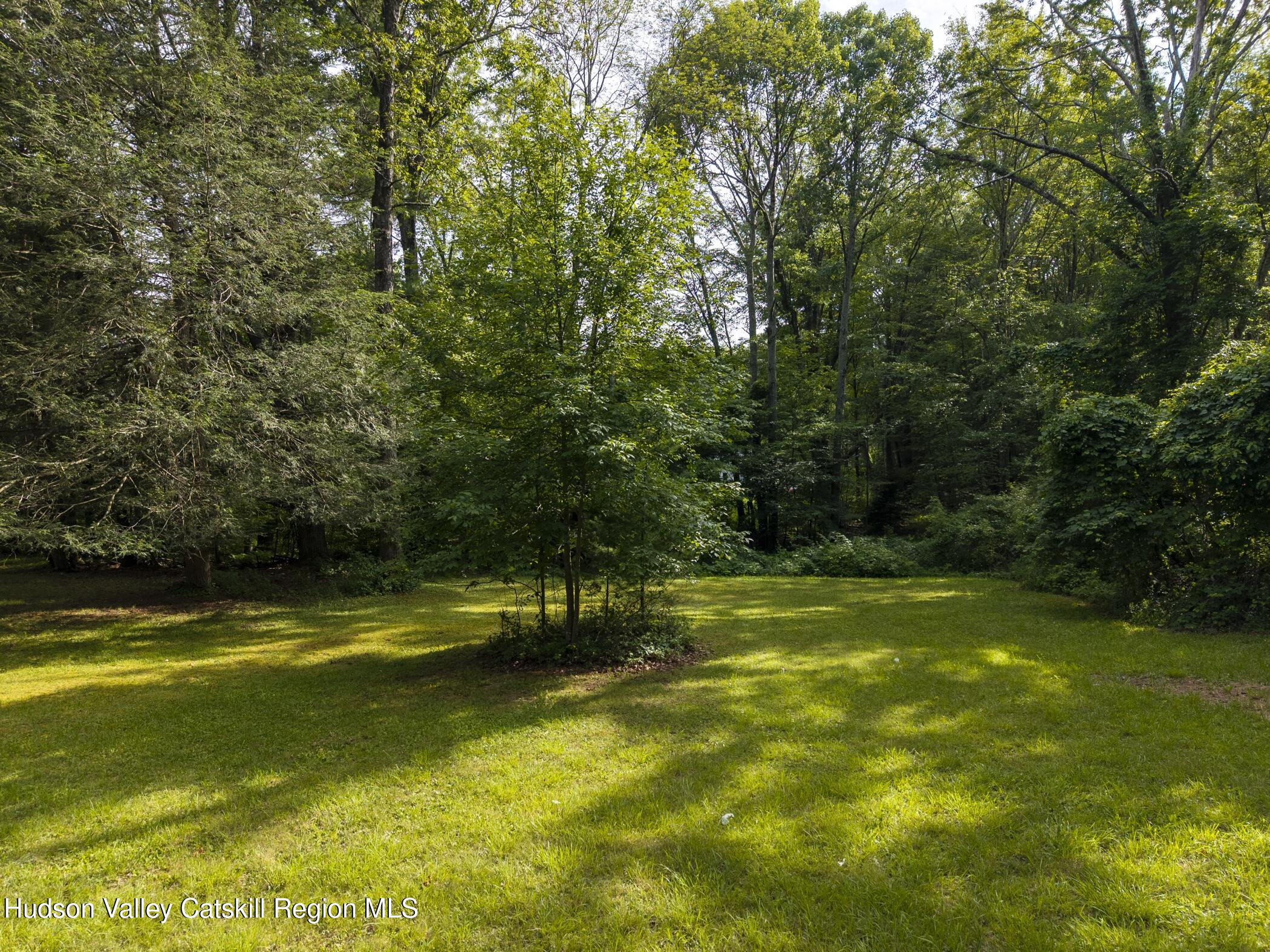 Tbd Bostock Road Shokan, NY 12481 - Photo 16 of 20 a view of a swimming pool with a yard and large trees