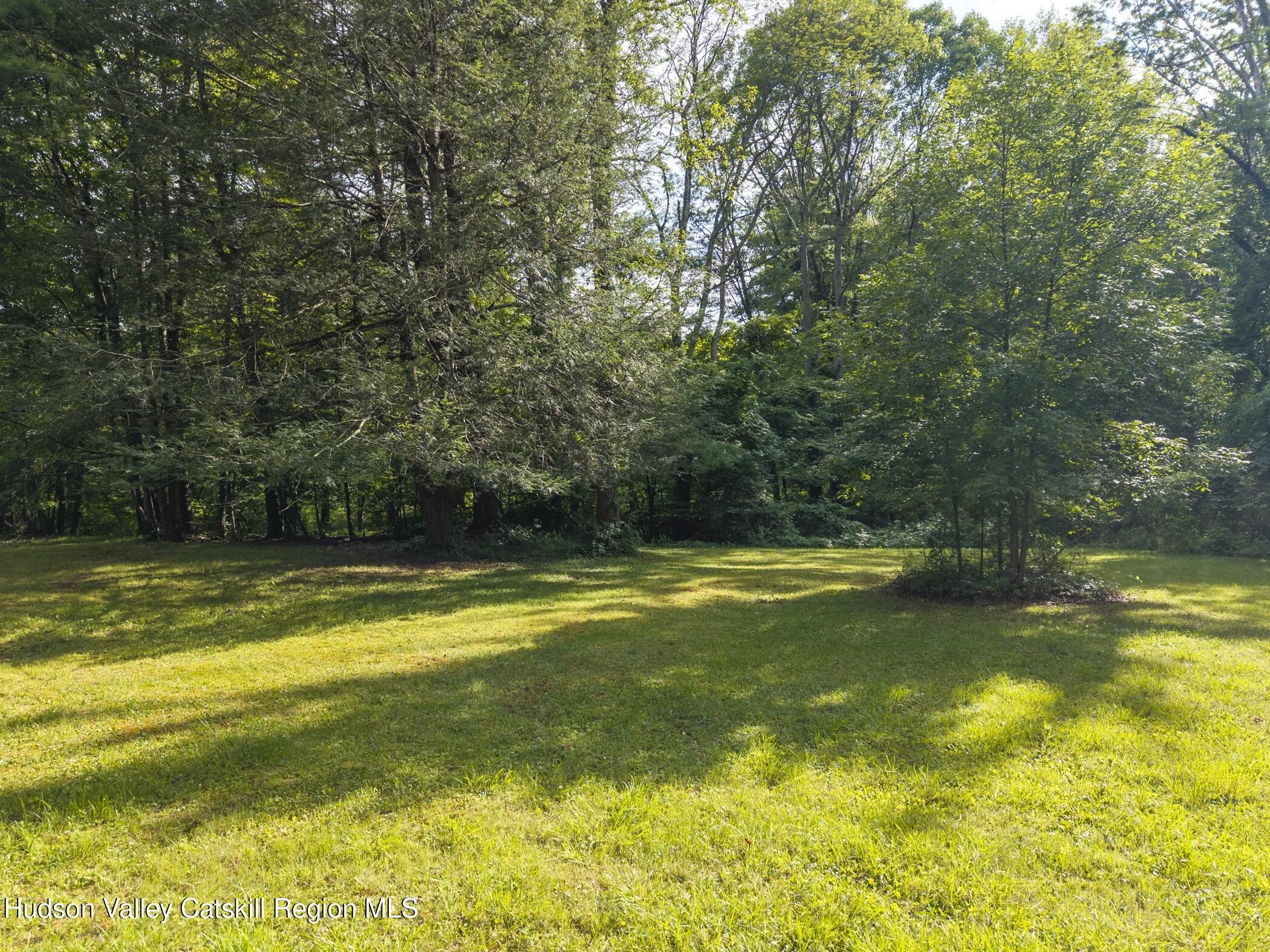Tbd Bostock Road Shokan, NY 12481 - Photo 10 of 20 a view of a swimming pool with an outdoor space and seating area