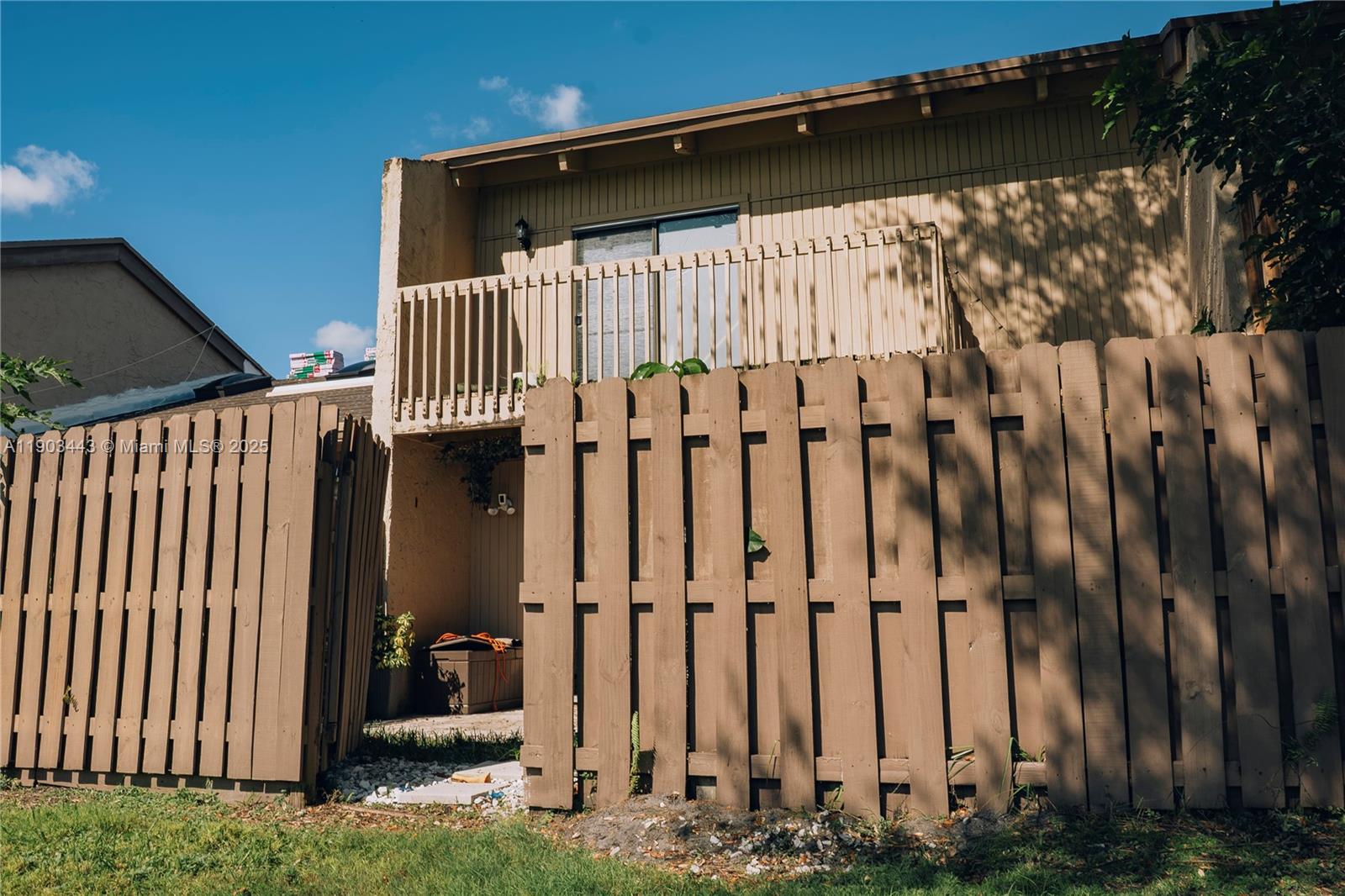 2152 Southwest 81st Way Davie, FL 33324 - Photo 22 of 27 a view of a backyard with wooden fence