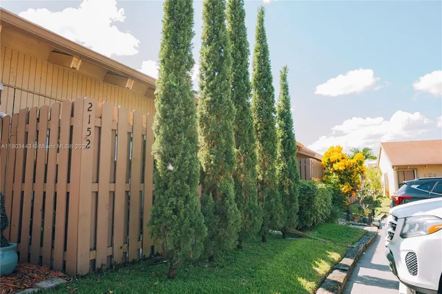 a view of a backyard with garden