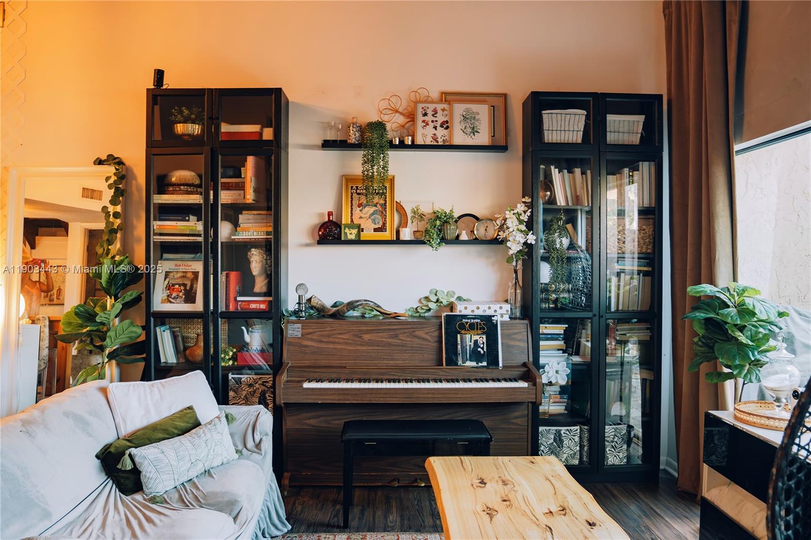 2152 Southwest 81st Way Davie, FL 33324 - Photo 8 of 27 a living room with furniture and a potted plant