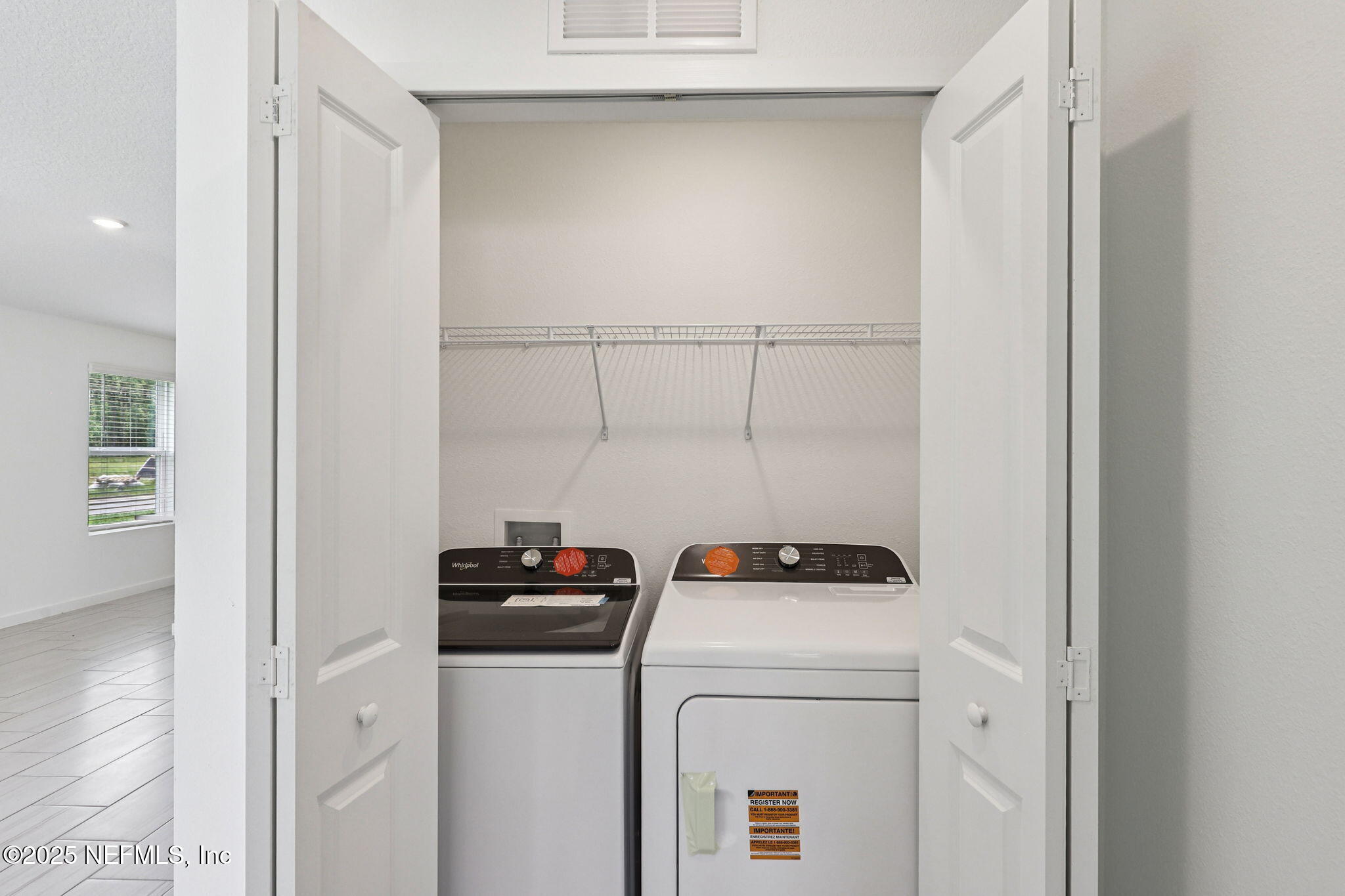 9709 Amber Vlg Road Jacksonville, FL 32219 - Photo 15 of 25 a utility room with dryer and washer