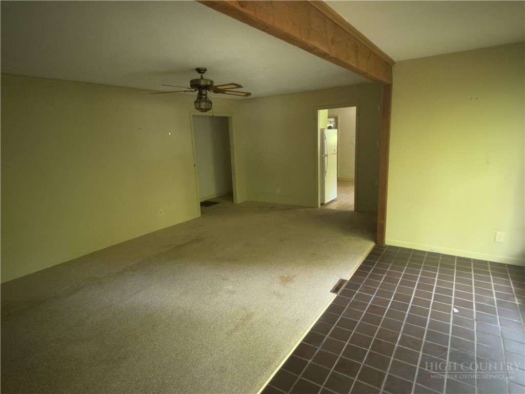 1205 Bamboo Road Boone, NC 28607 - Photo 16 of 17 an empty room with windows