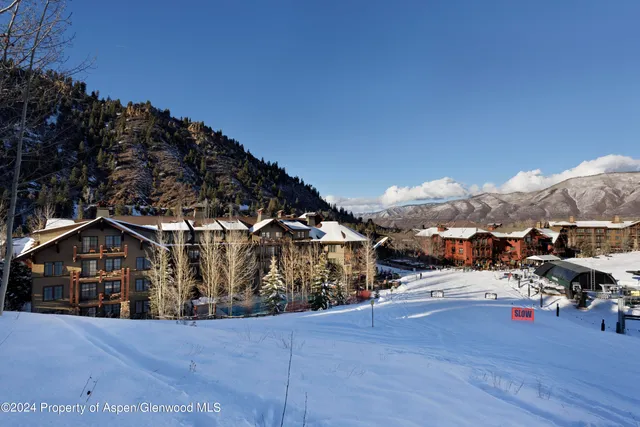 a view of a house next to a road