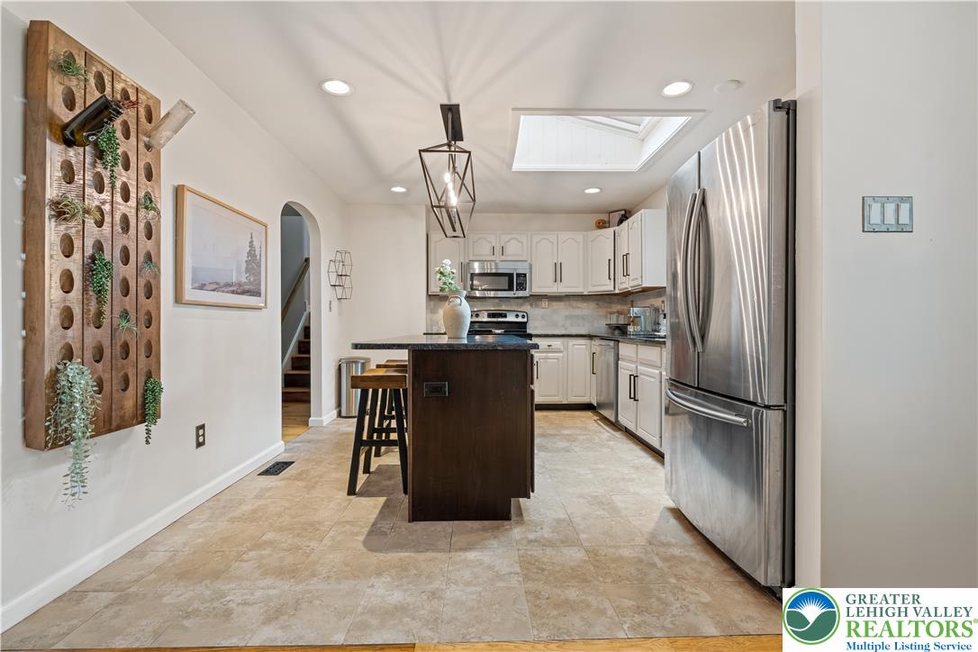2569 Woods Edge Road Bath, PA 18014 - Photo 11 of 40 An overhead skylight floods this well-appointed kitchen with abundant natural light.