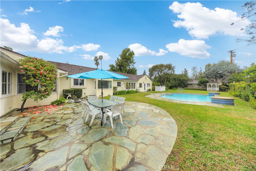 2835 Devonport Road San Marino, CA 91108 - Photo 42 of 54 a view of a house with swimming pool and sitting area