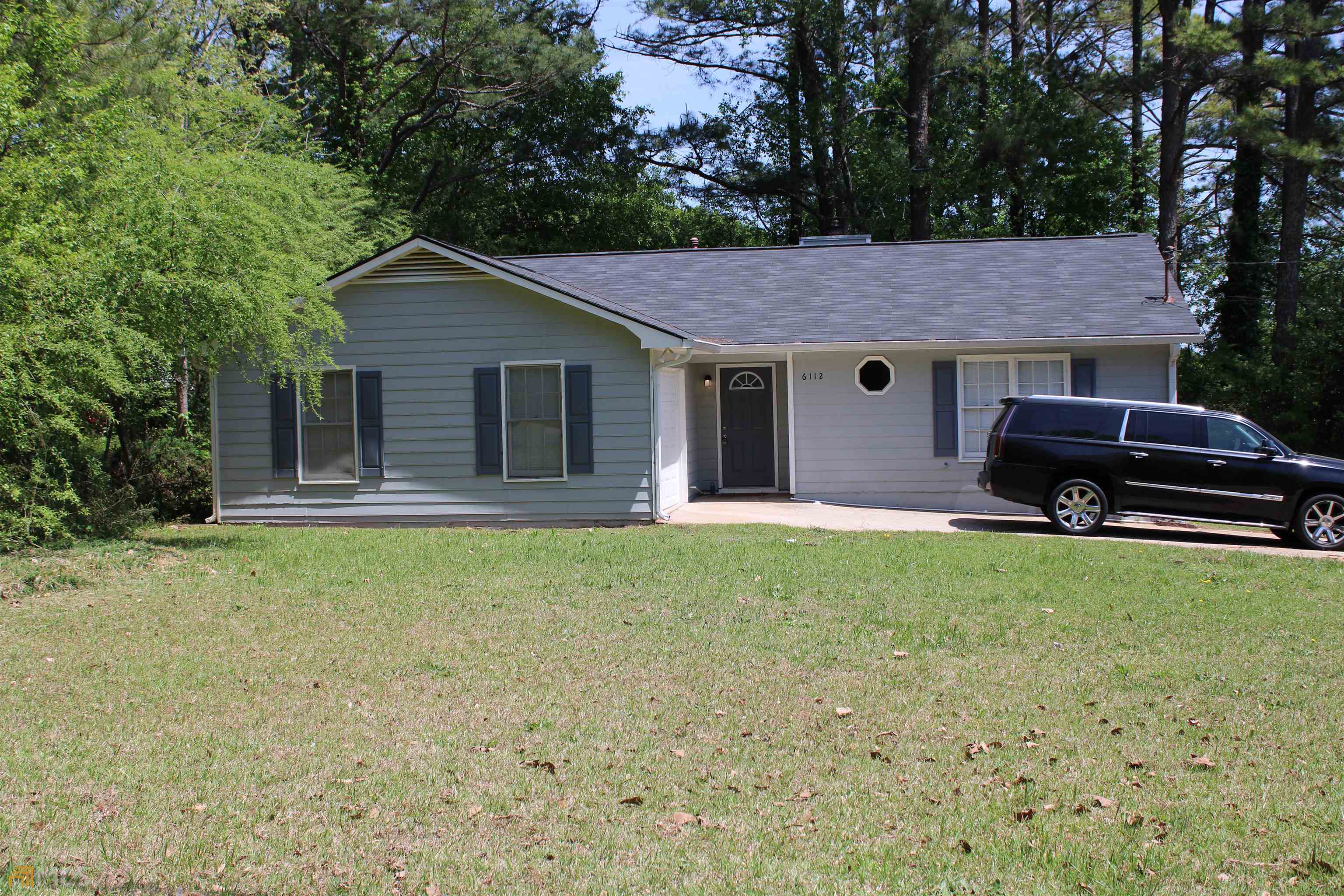 6112 Chaseland Road Rex, GA 30273 - Photo 1 of 1 a house view with a garden space