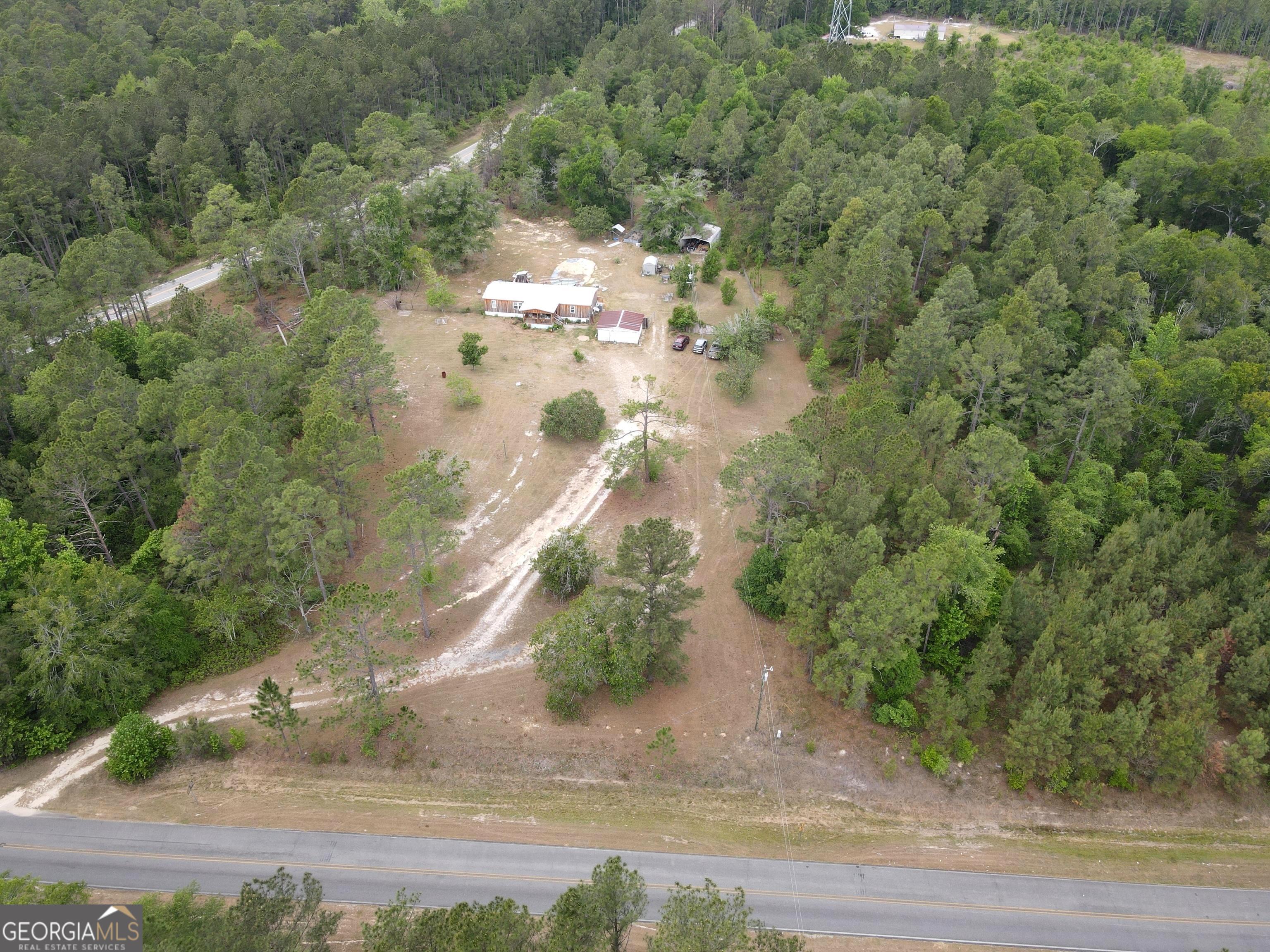 19 Cow Ford Bridge Road Adrian, GA 31002 - Photo 16 of 22 a view of a yard