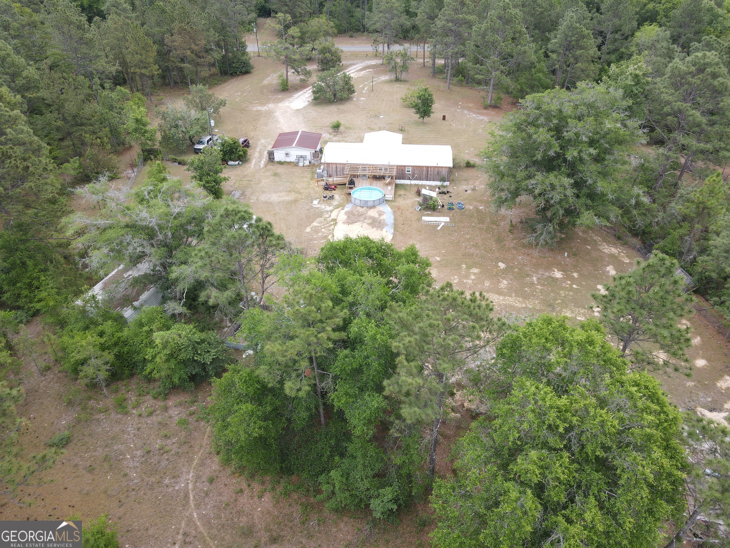 19 Cow Ford Bridge Road Adrian, GA 31002 - Photo 18 of 22 an aerial view of a house with outdoor space