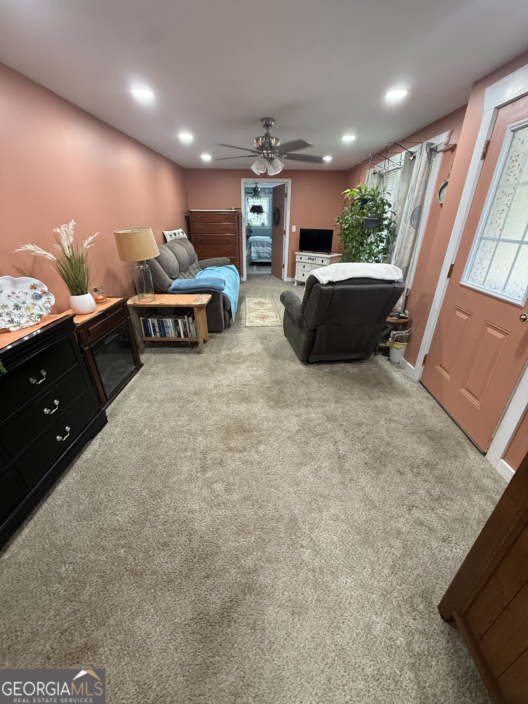19 Cow Ford Bridge Road Adrian, GA 31002 - Photo 5 of 22 a living room with furniture and a flat screen tv