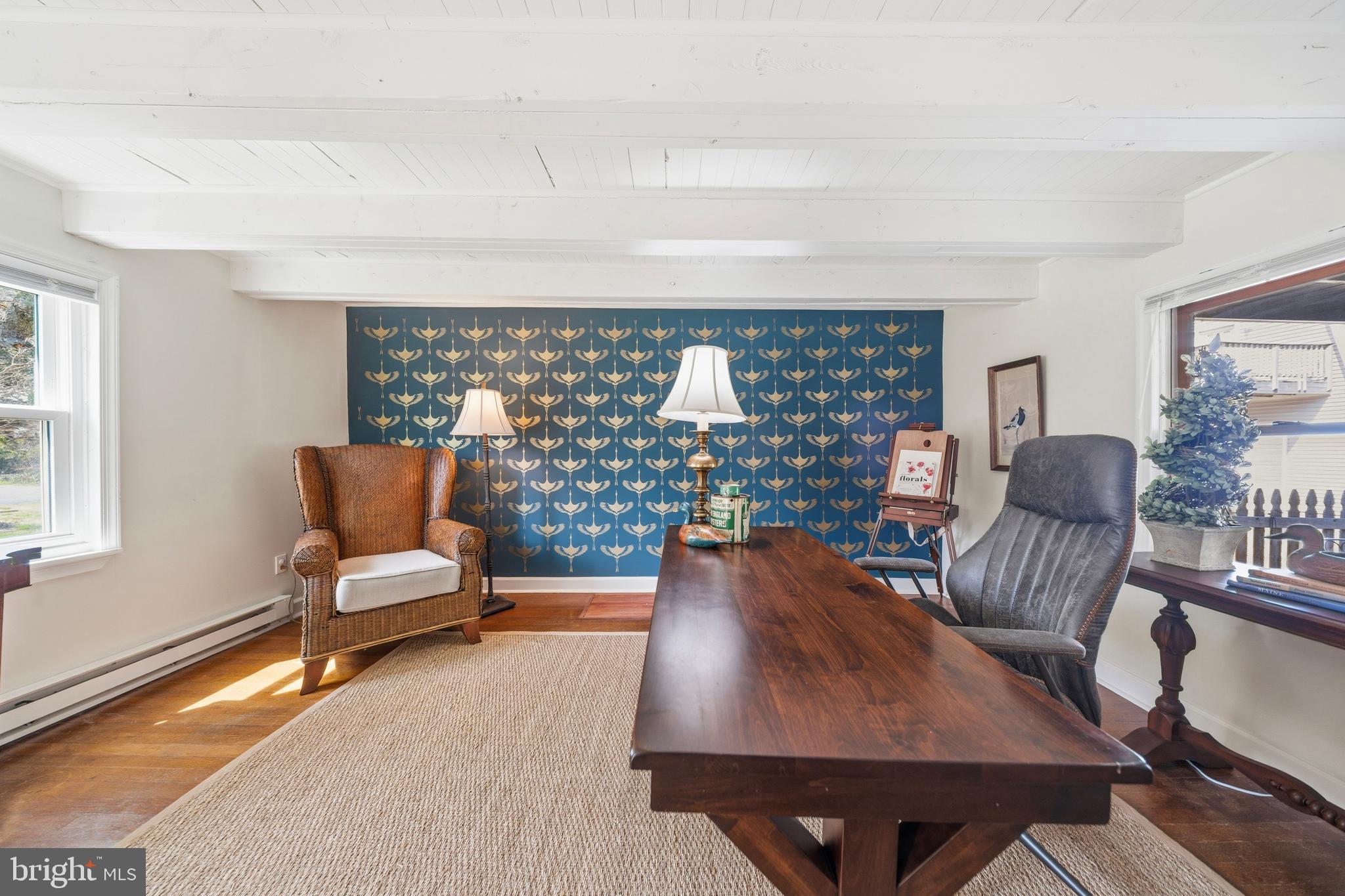 20826 Bivalve Wharf Road Bivalve, MD 21865 - Photo 12 of 52 a living room with furniture rug and lamp