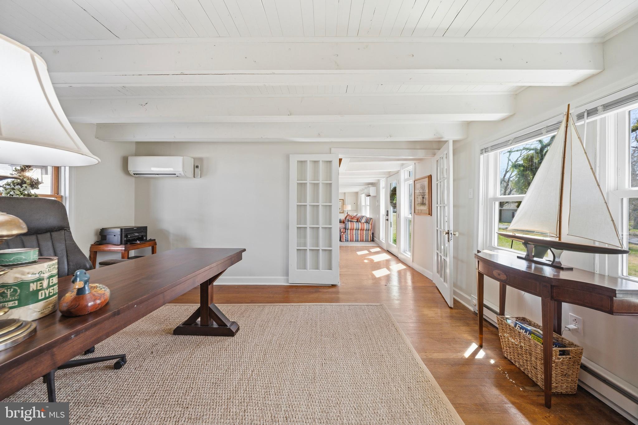 20826 Bivalve Wharf Road Bivalve, MD 21865 - Photo 13 of 52 a view of a workspace with furniture and a window