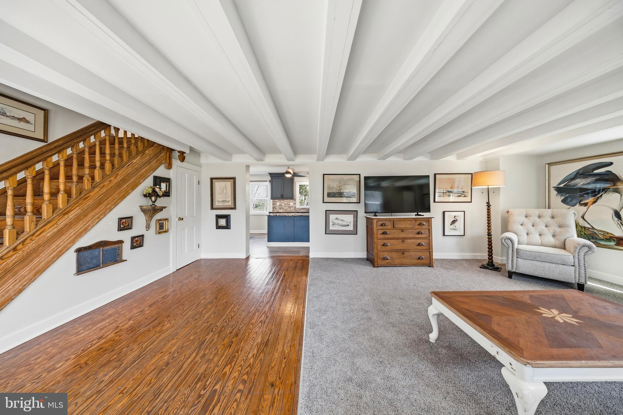 20826 Bivalve Wharf Road Bivalve, MD 21865 - Photo 14 of 52 a living room with furniture and a flat screen tv