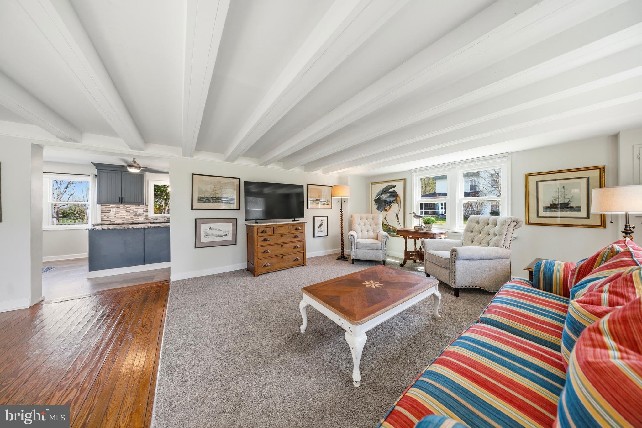 20826 Bivalve Wharf Road Bivalve, MD 21865 - Photo 15 of 52 a living room with furniture and a wooden floor