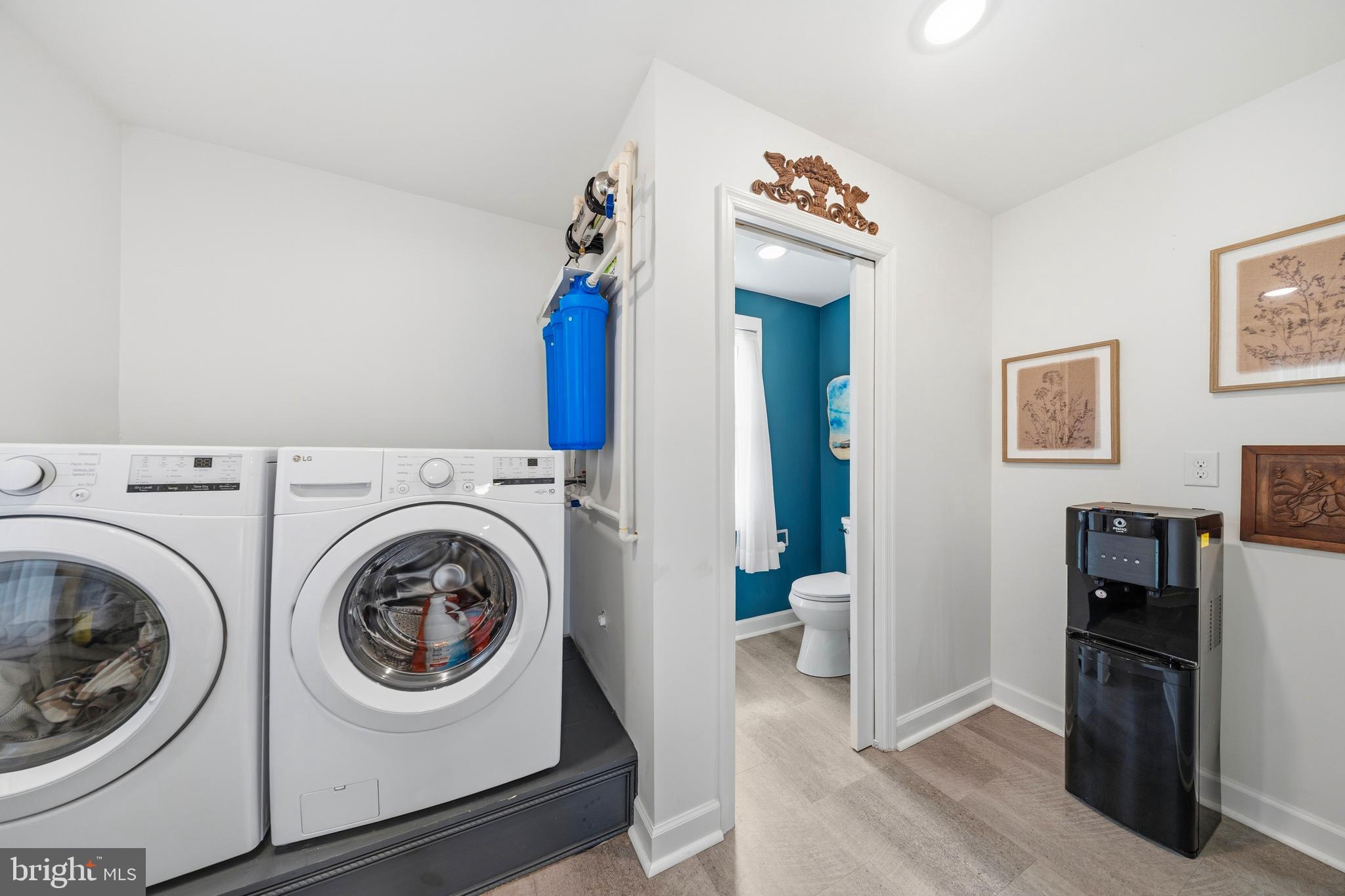 20826 Bivalve Wharf Road Bivalve, MD 21865 - Photo 21 of 52 a view of a bedroom with washer and dryer