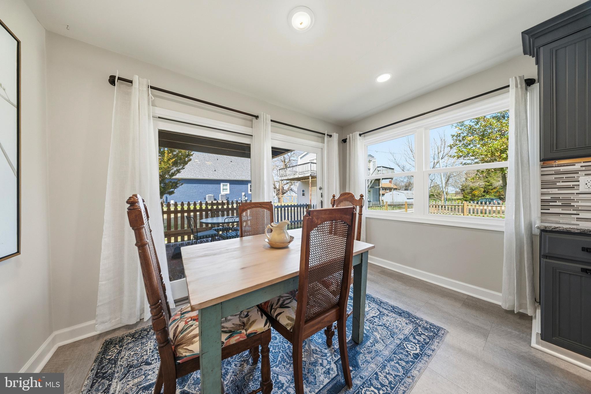 20826 Bivalve Wharf Road Bivalve, MD 21865 - Photo 24 of 52 a view of a dining room with furniture window and outside view
