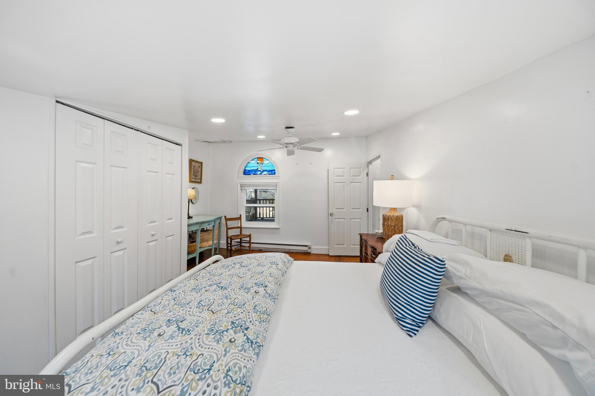 20826 Bivalve Wharf Road Bivalve, MD 21865 - Photo 30 of 52 a bedroom with a bed and a dresser