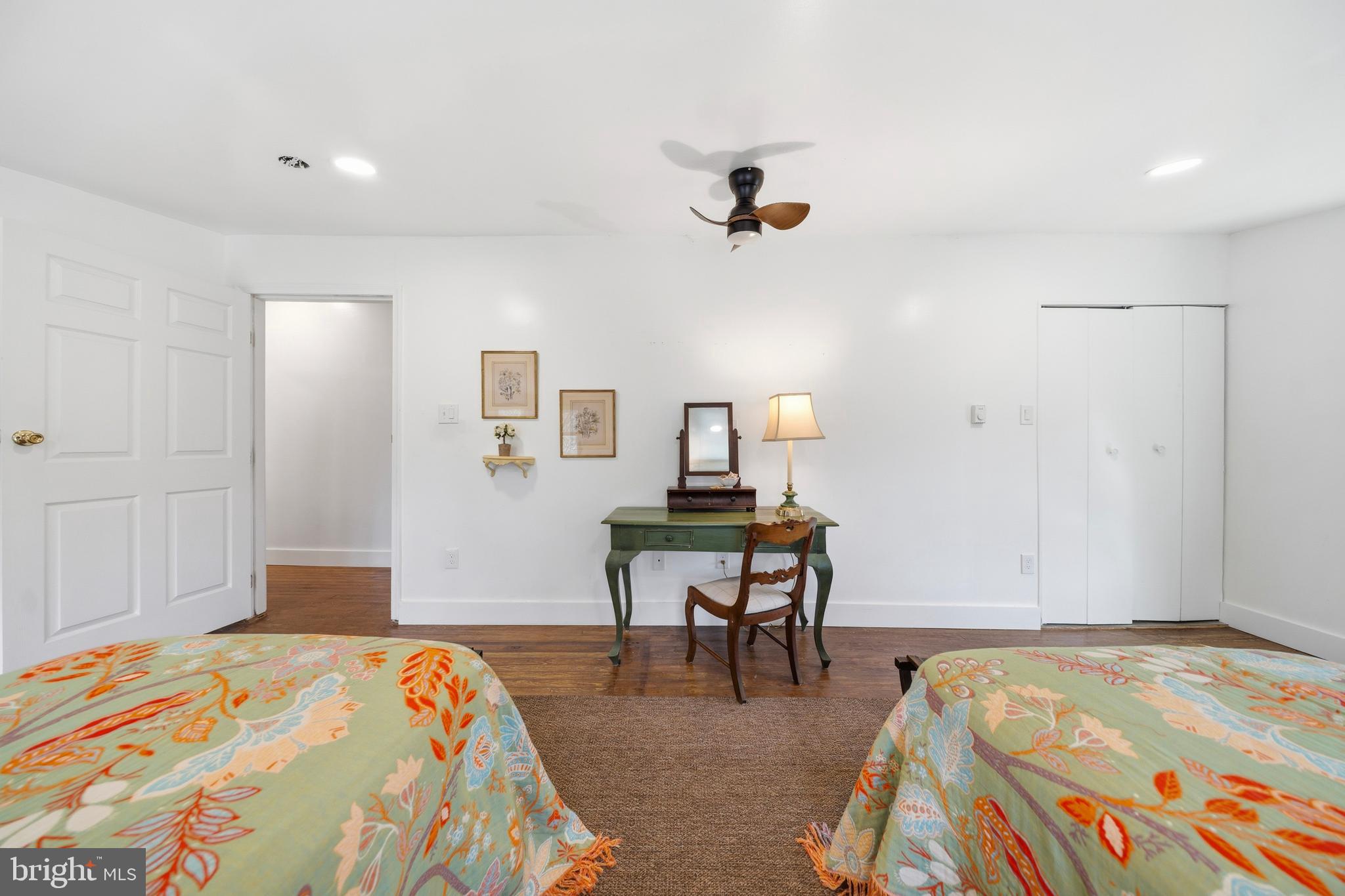 20826 Bivalve Wharf Road Bivalve, MD 21865 - Photo 35 of 52 a bedroom with a bed and a table in it