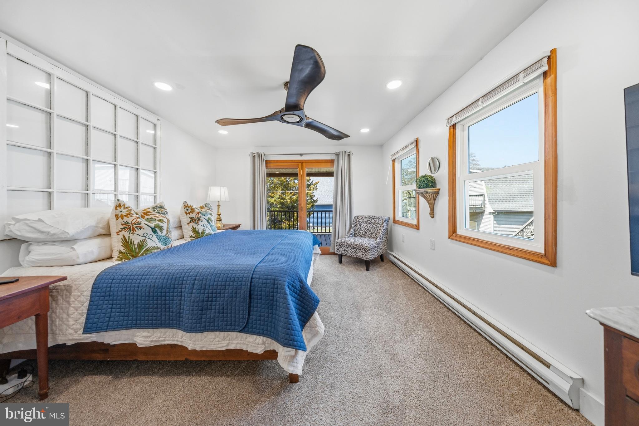 20826 Bivalve Wharf Road Bivalve, MD 21865 - Photo 38 of 52 a bedroom with furniture and a large window