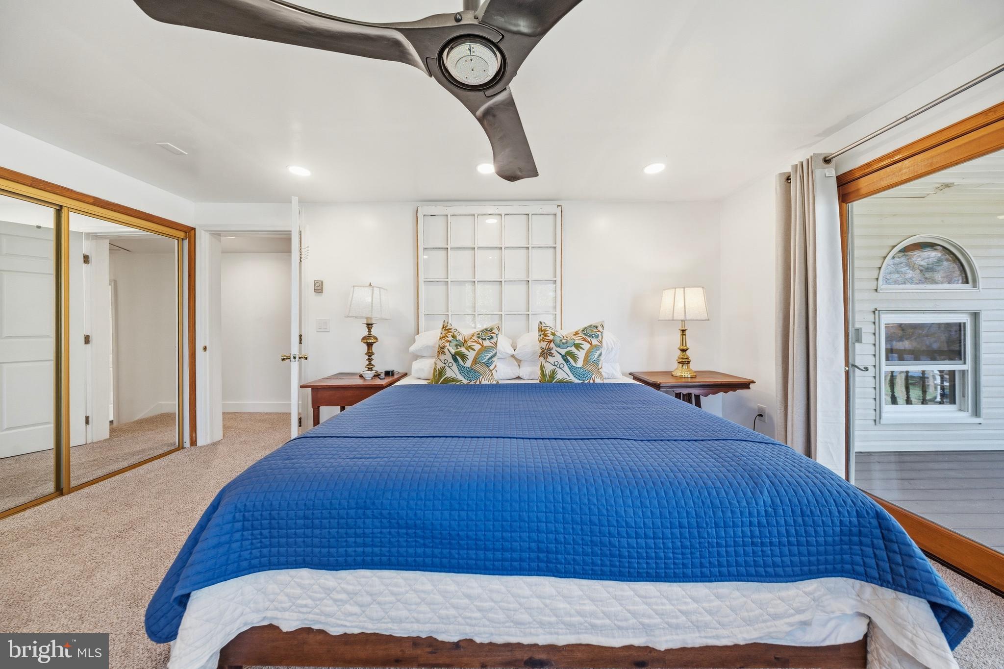 20826 Bivalve Wharf Road Bivalve, MD 21865 - Photo 39 of 52 a bed room with a bed and a painting