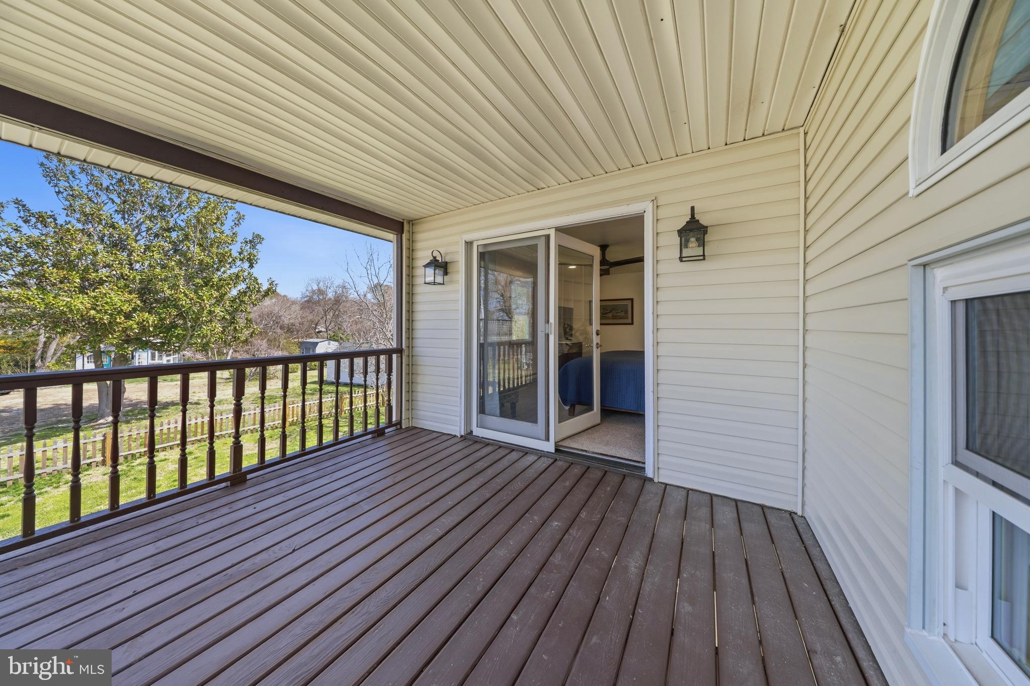 20826 Bivalve Wharf Road Bivalve, MD 21865 - Photo 41 of 52 an empty room with wooden floor and windows