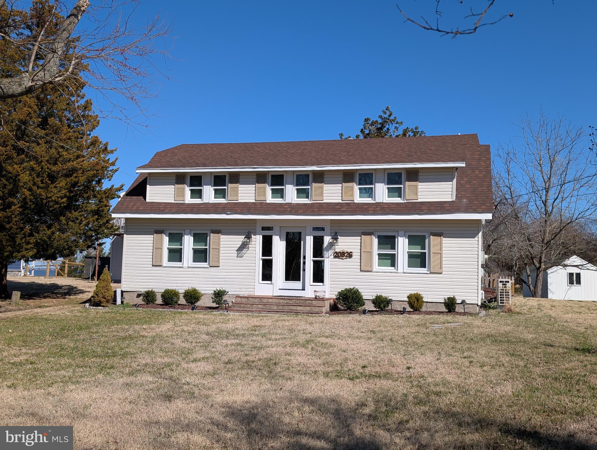 20826 Bivalve Wharf Road Bivalve, MD 21865 - Photo 42 of 52 a front view of a house with a yard