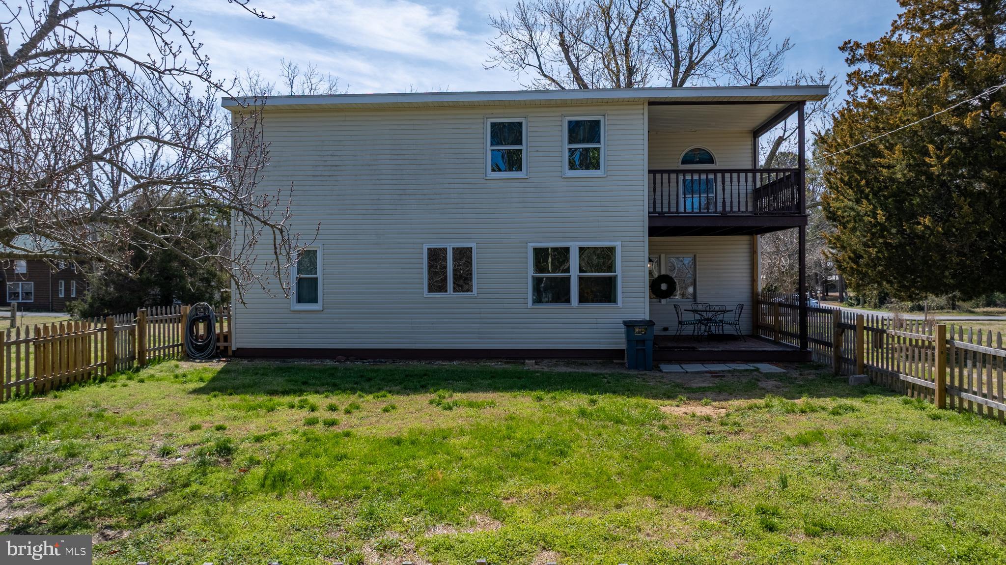 20826 Bivalve Wharf Road Bivalve, MD 21865 - Photo 47 of 52 a view of a house with a yard and sitting area